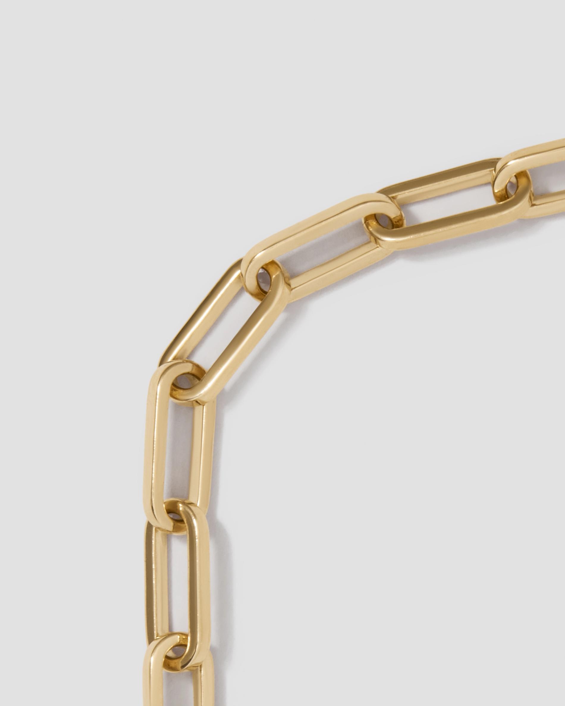 18k paperclip chain on a grey background