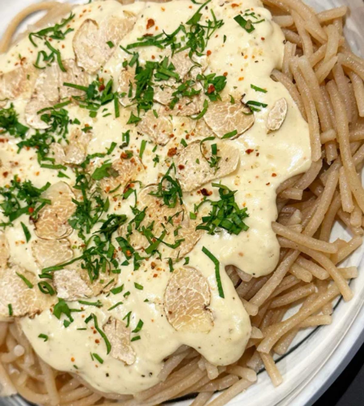 Grain free pasta coated in dairy free truffle cream sauce, fresh parsley, and JF Spicy Salt. 