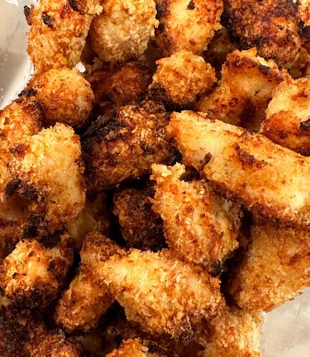 Plate of crispy air fried popcorn chicken