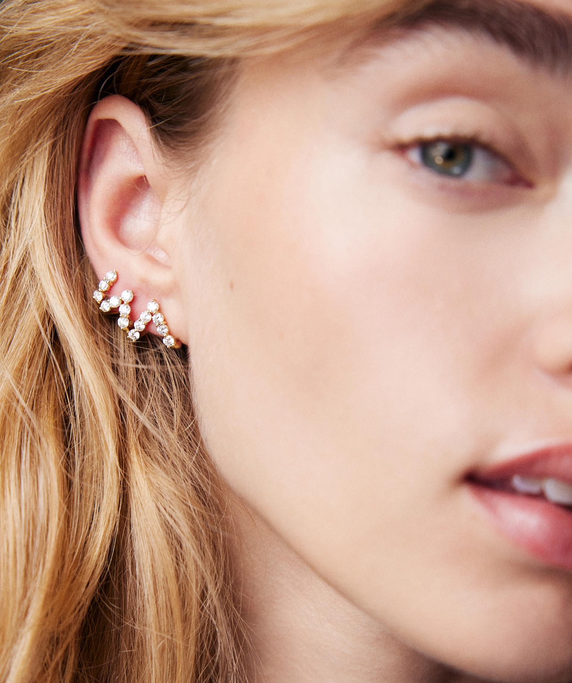 model in diamond huggies