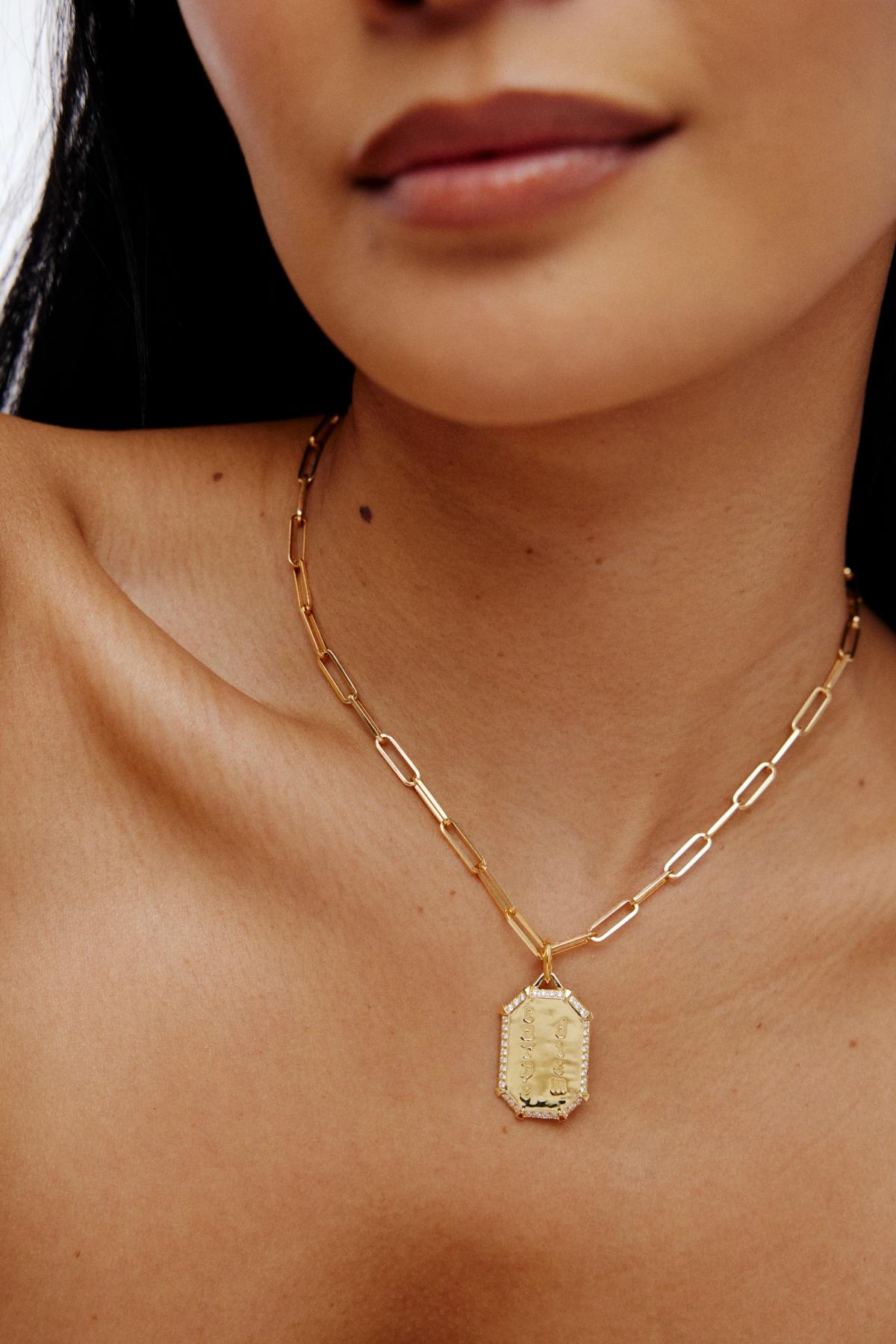 neck with custom necklace on