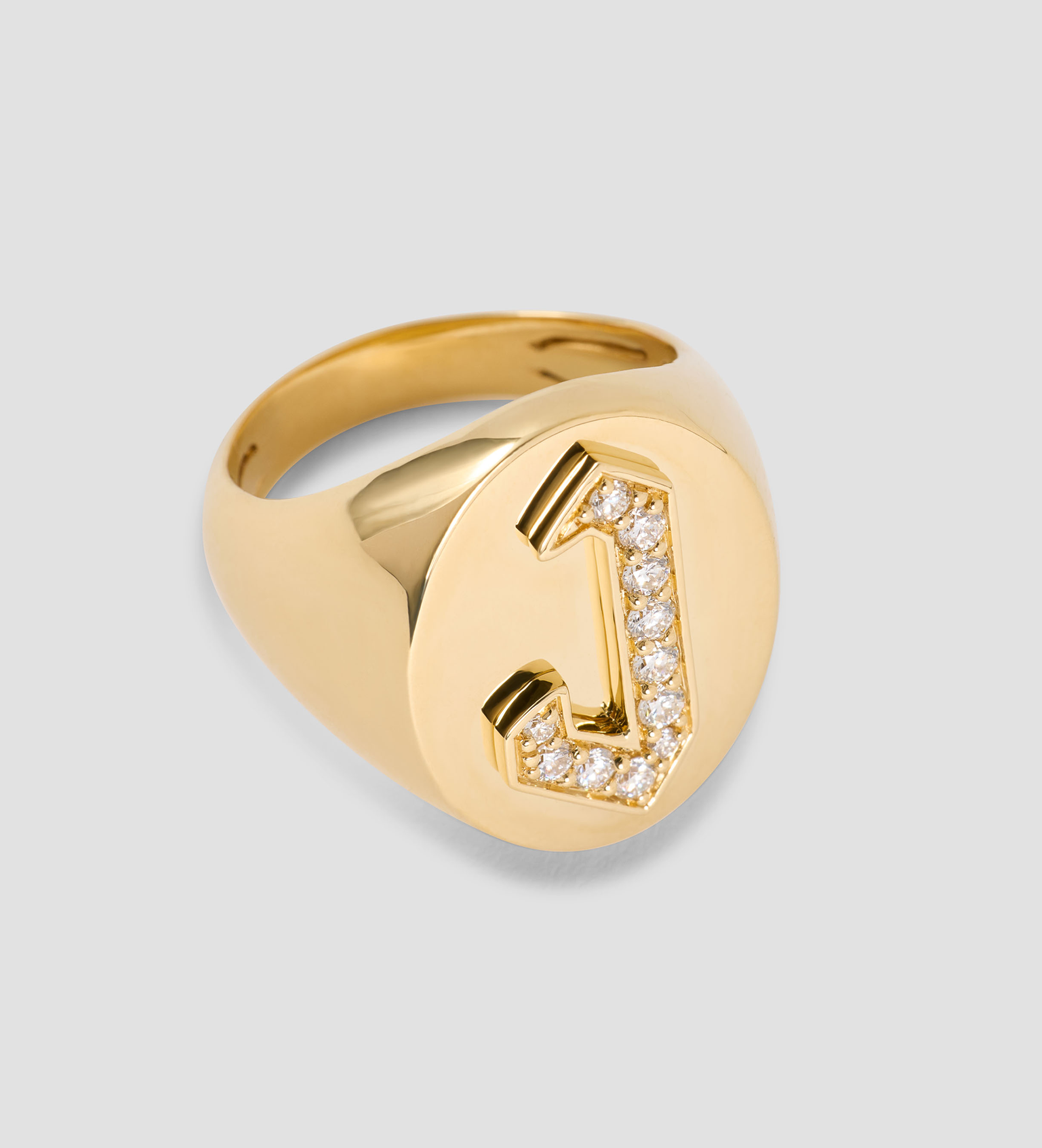 Large sigent ring with a J encrusted with diamonds