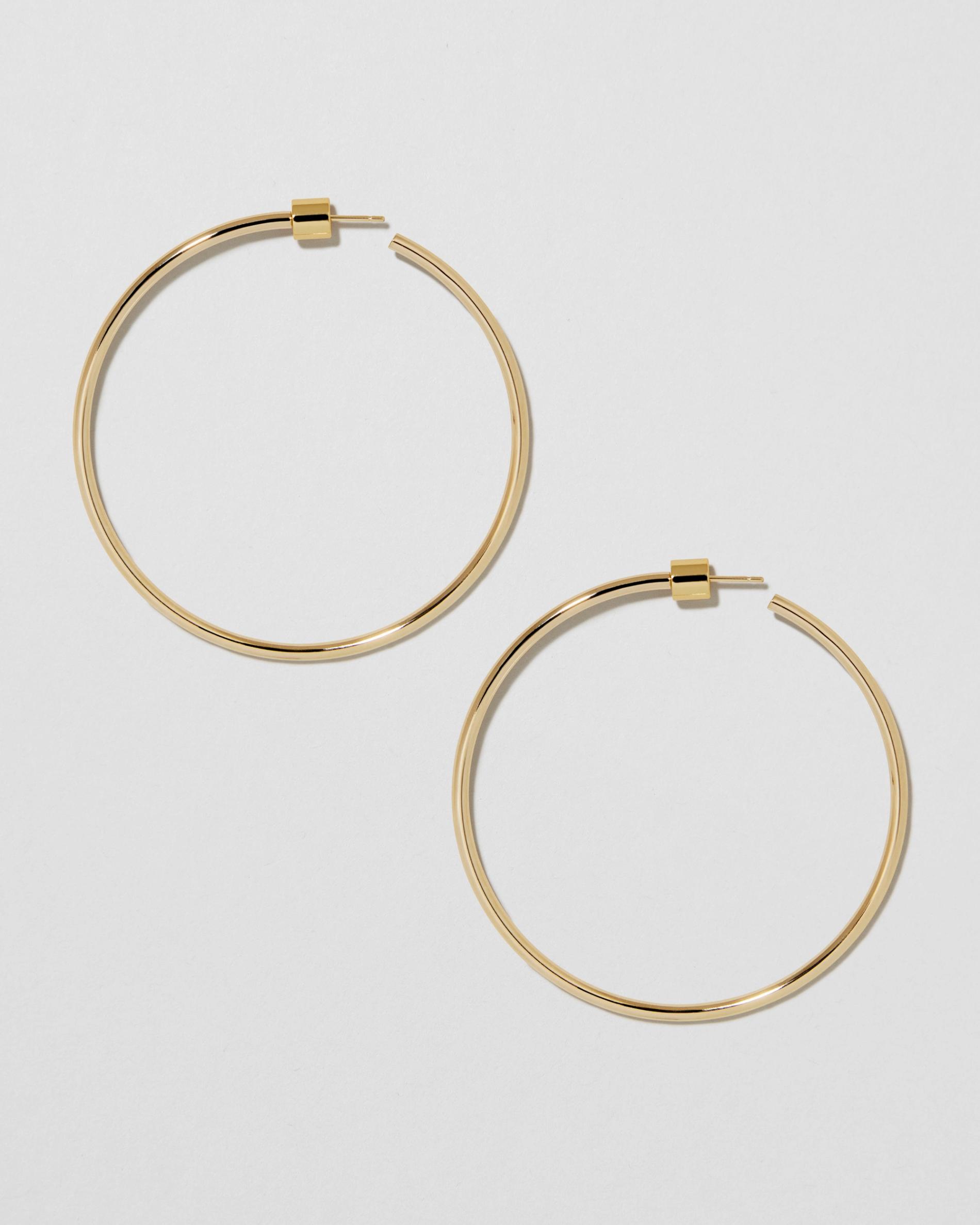 smooth lightweight gold shiny hoops 14k gold posts