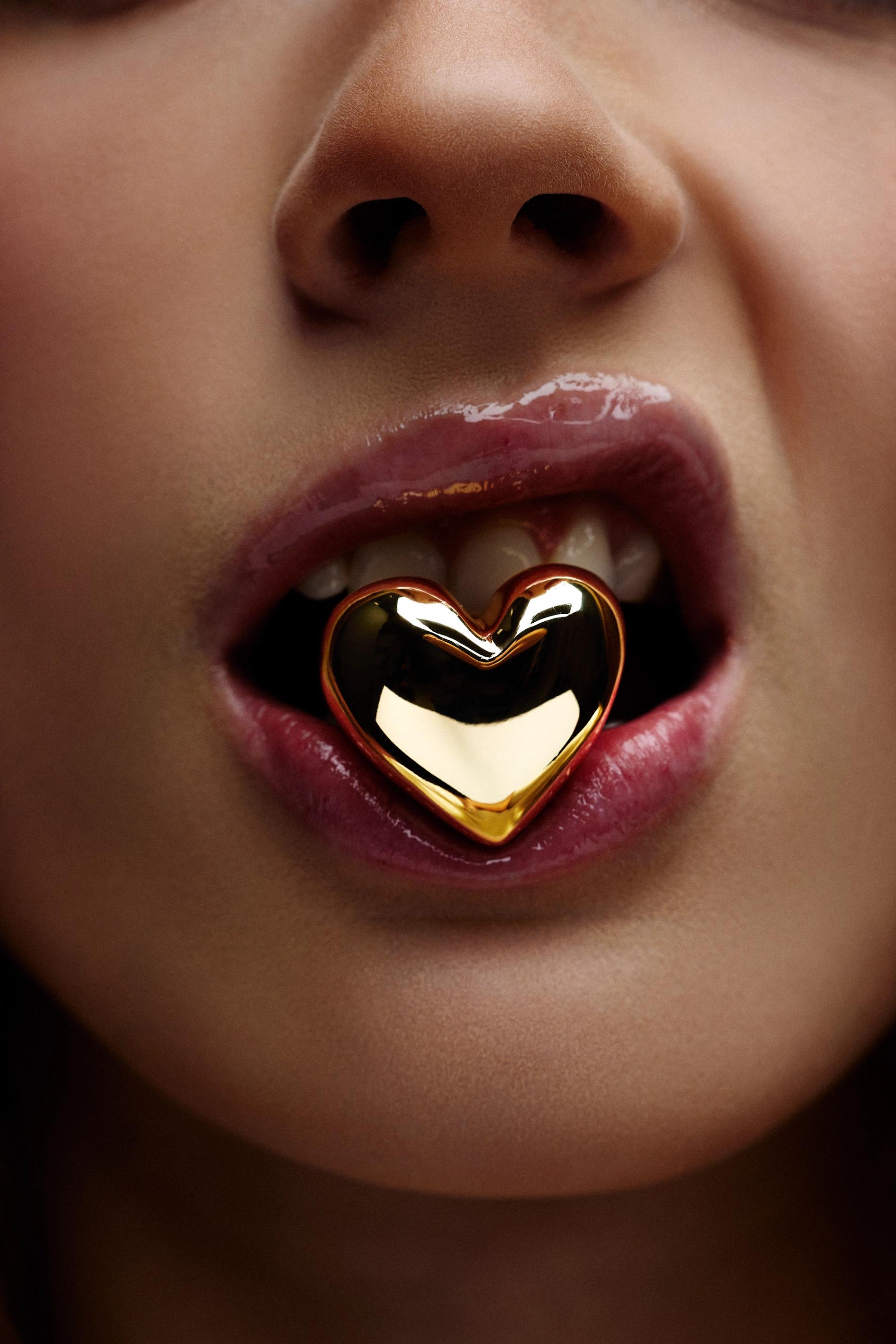 model wearing gold bracelets