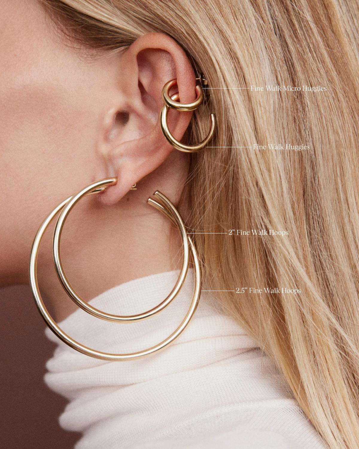 model wearing walk collection hoops in variety of sizes