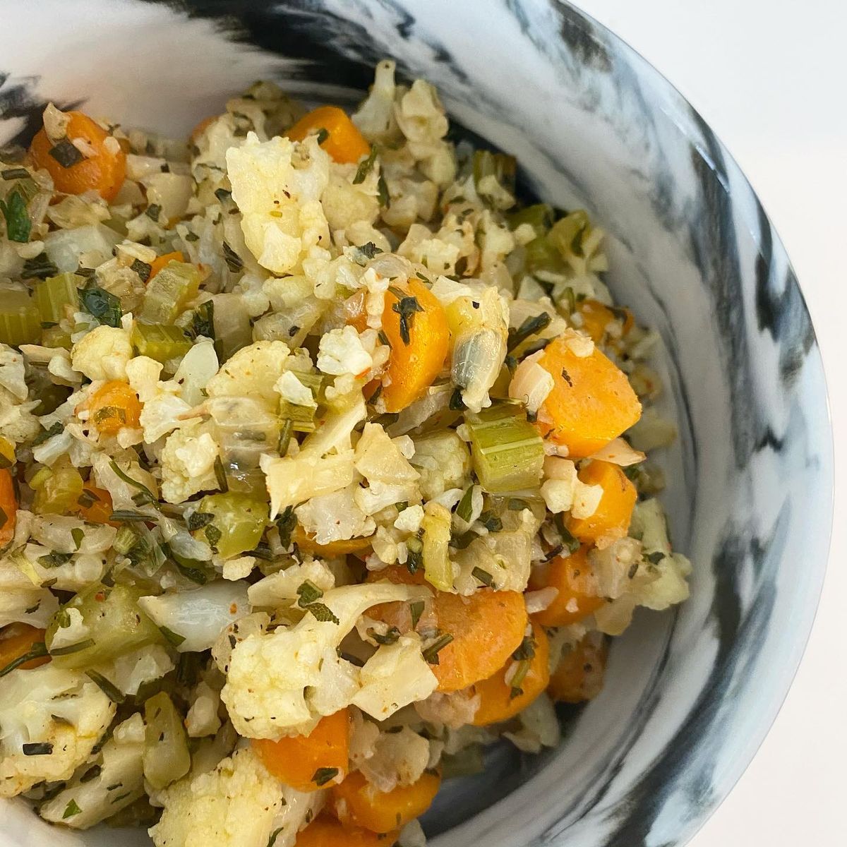 Close up image of cauliflower stuffing in a bowl