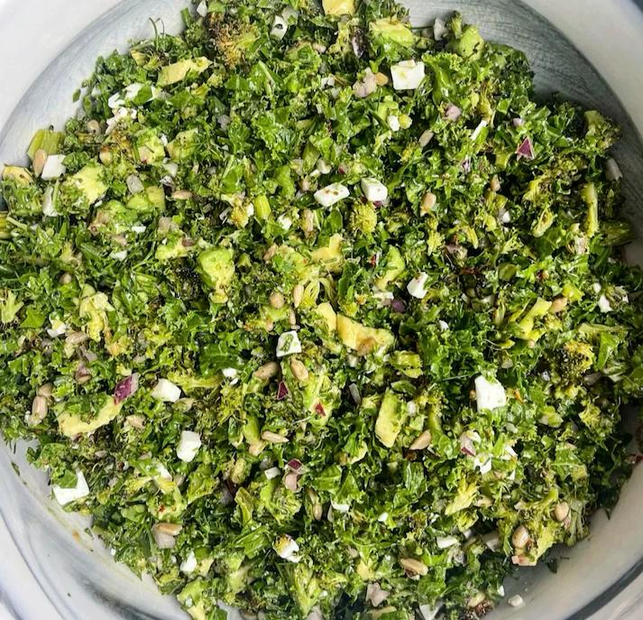 Kale salad with onion, feta, and roasted broccoli