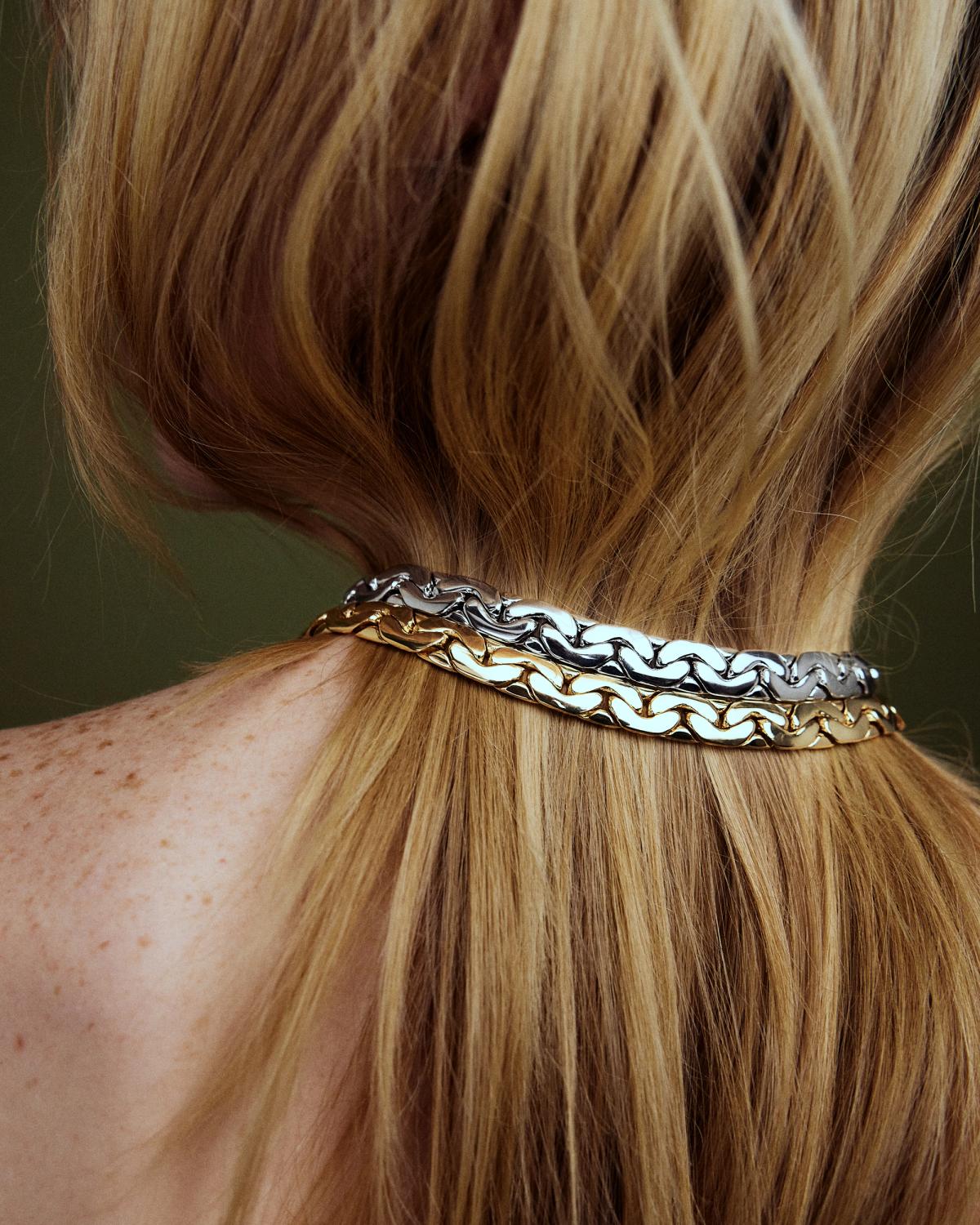 woman wearing a necklace