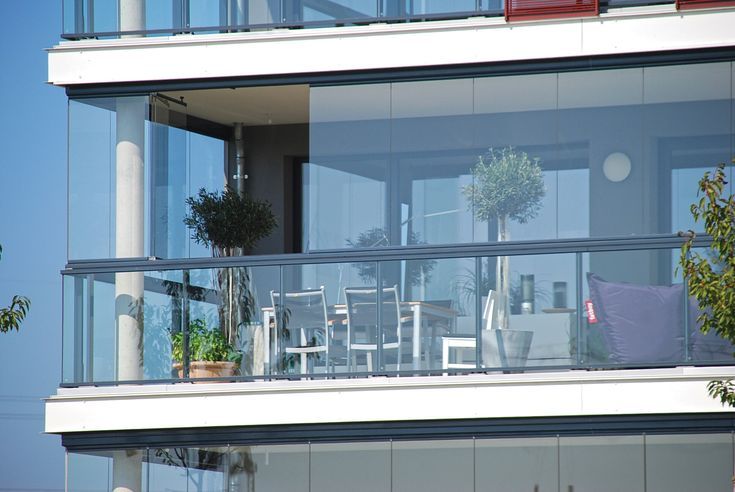 Folding balcony glass enclosure on a Dubai Marina high-rise apartment