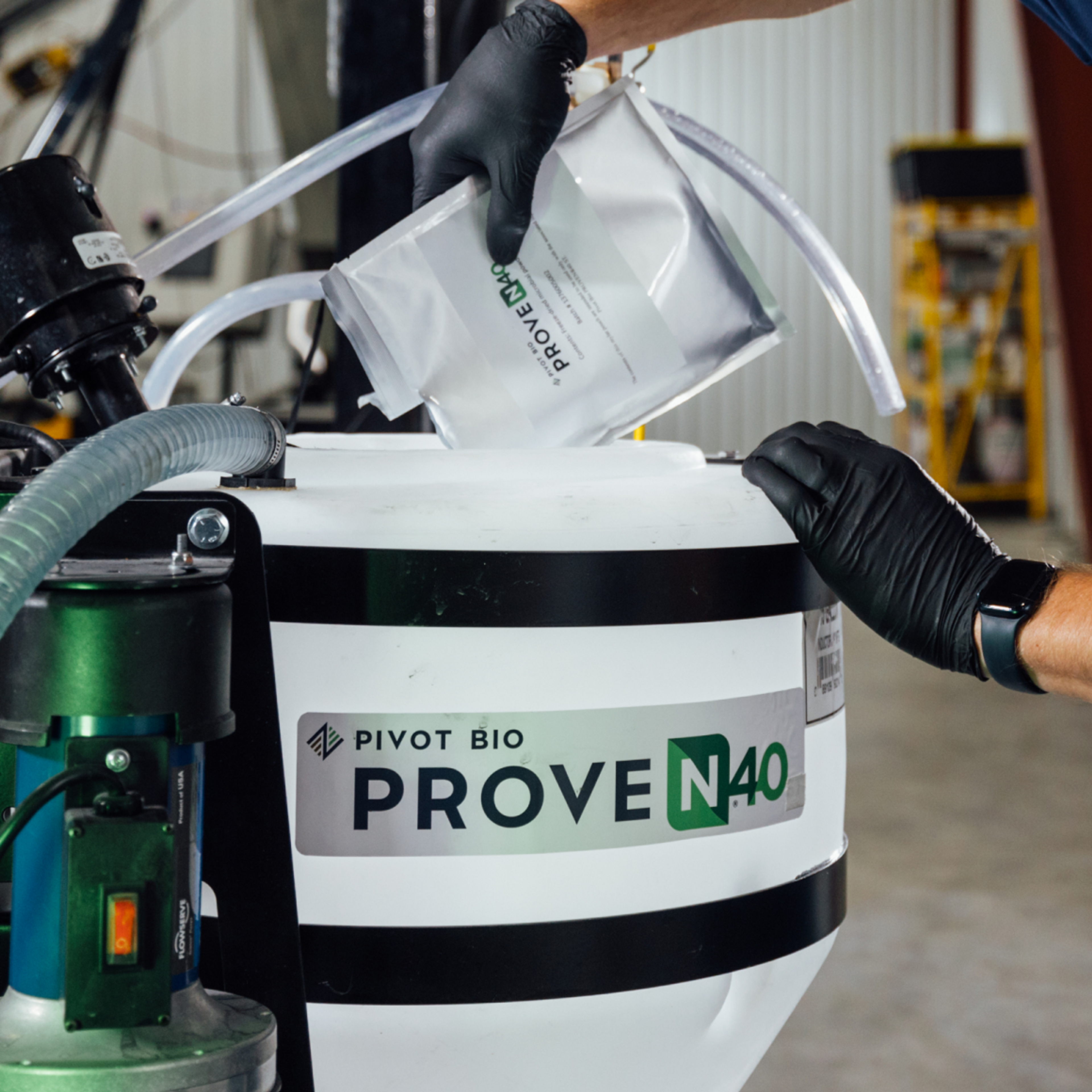 Pivot Bio On-Seed product being applied to tank
