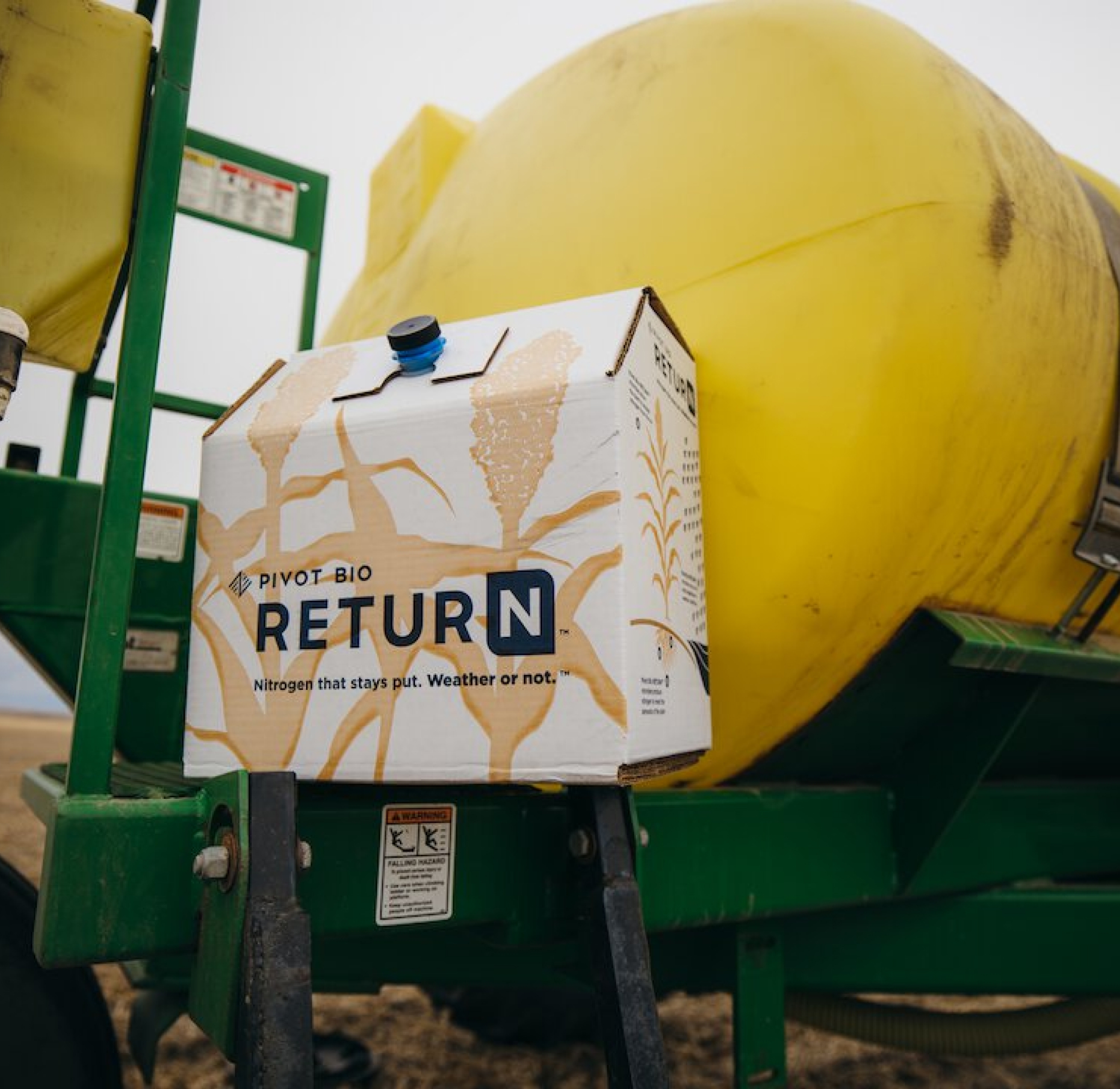 A box of Pivot Bio Return on Farm Equipment