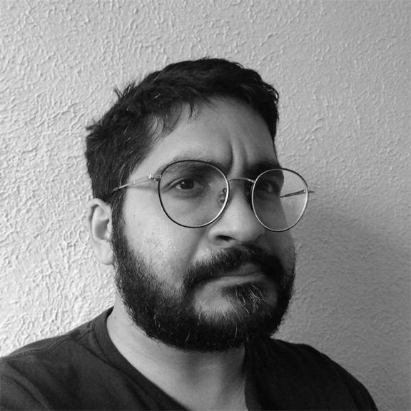 black and white selfie portrait of professor Ansari