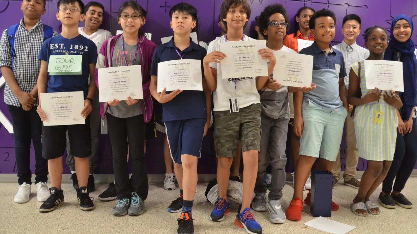 Group of SOSC students holding their certificates