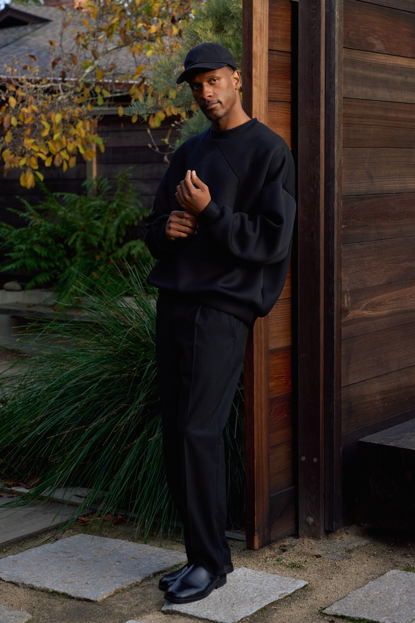 Model wearing the Glenwood Signature Crewneck – Home is a Foreign Place Collection