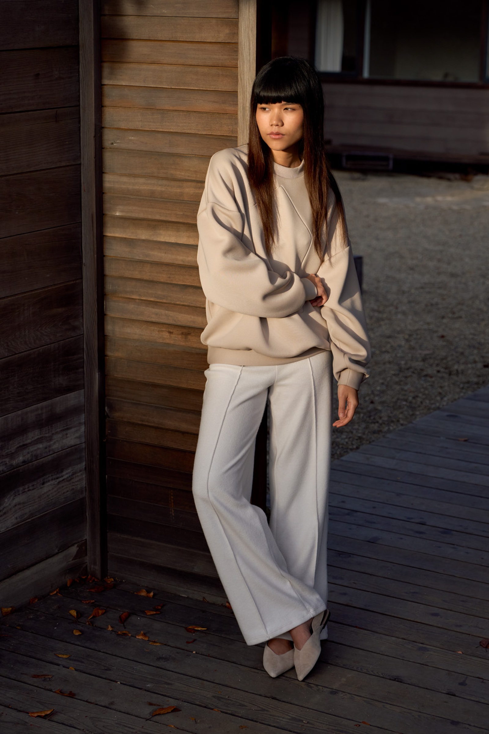 Model wearing the Glenwood Signature Crewneck – Home is a Foreign Place Collection