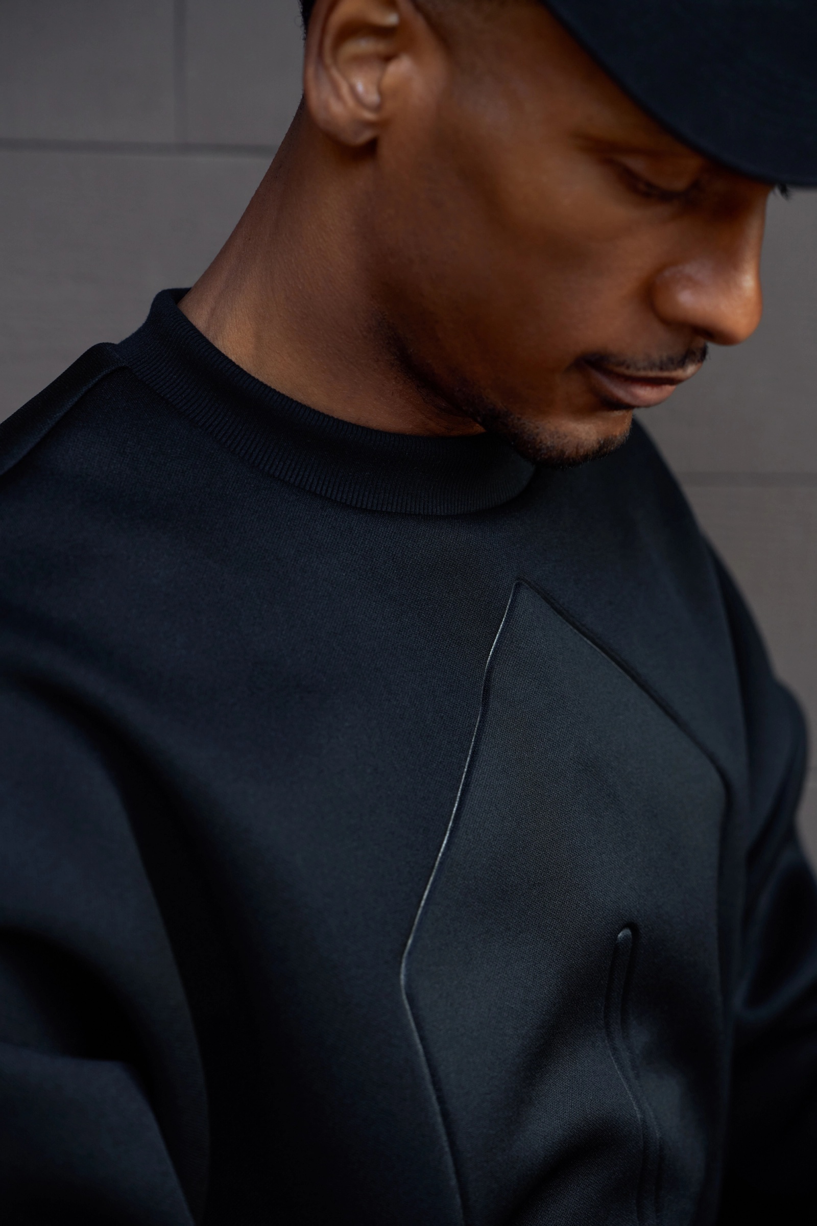 Model wearing the Glenwood Signature Crewneck – Home is a Foreign Place Collection