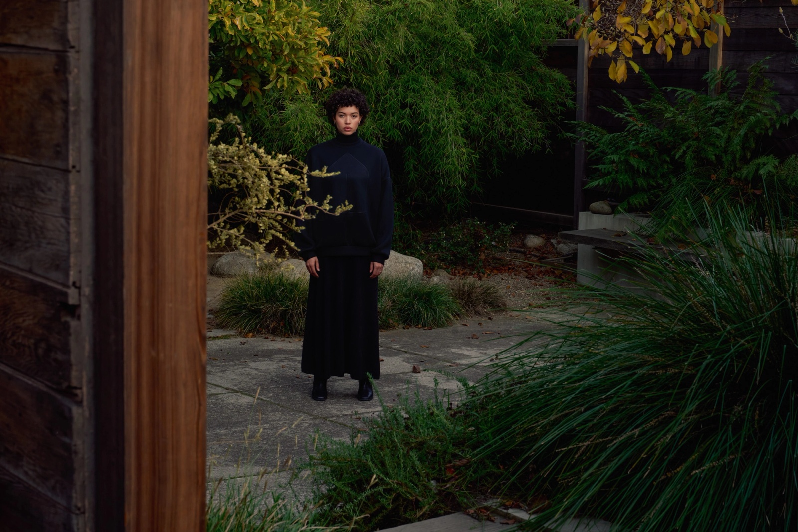 Model wearing the Glenwood Signature Crewneck – Home is a Foreign Place Collection