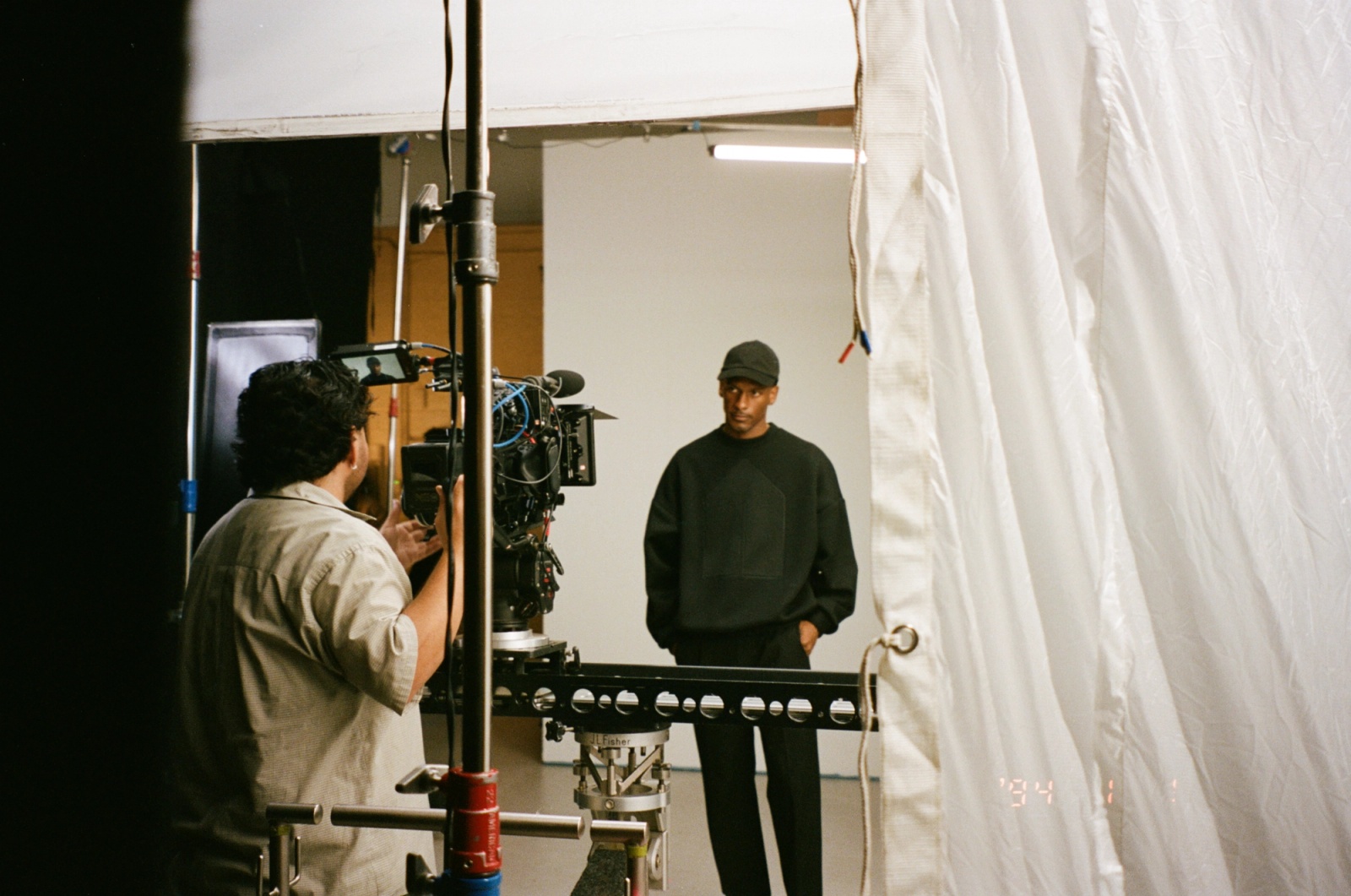 Behind the Scenes shot of Models wearing Glenwood's Signature Crewneck in Black – Home is a Foreign Place Collection