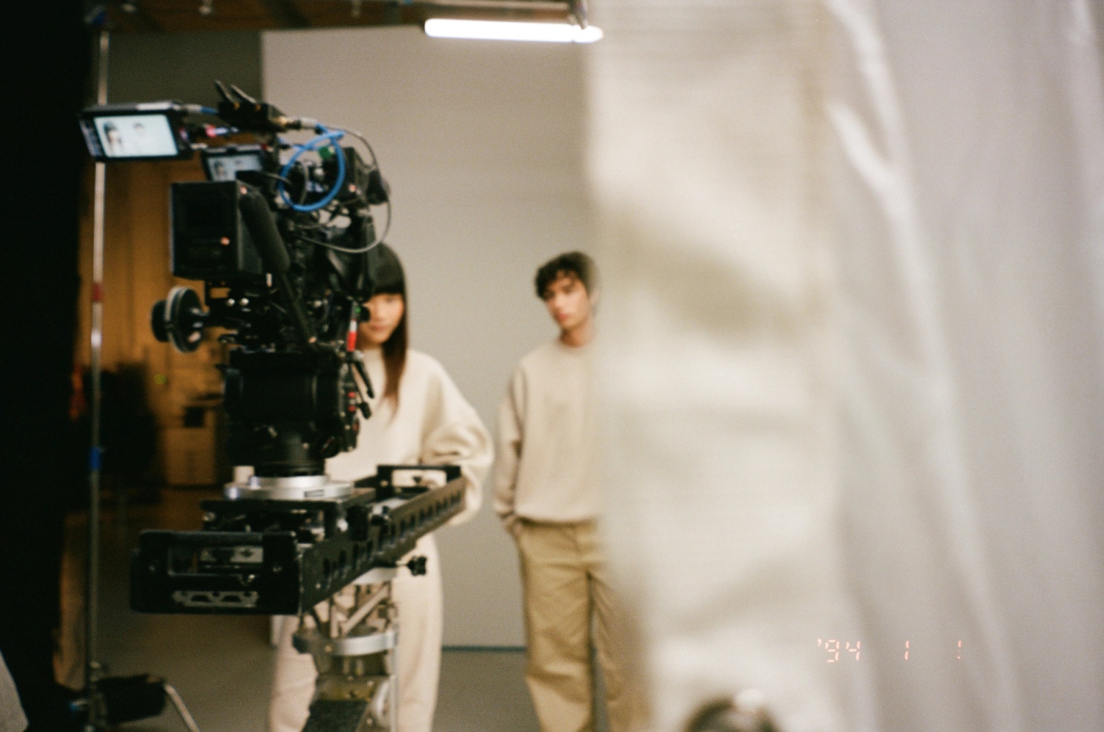 Behind the Scenes shot of Models wearing Glenwood's Signature Crewneck in Taupe – Home is a Foreign Place Collection