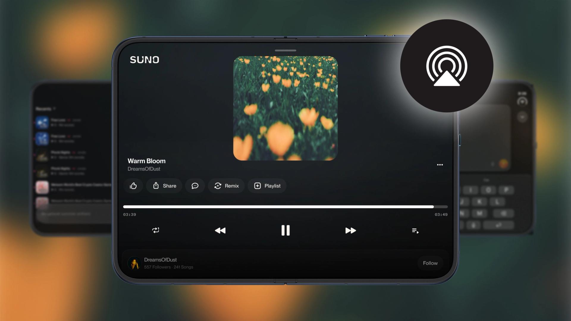 Suno app player on a foldable phone, unfolded in landscape. The screen shows the song ‘Warm Bloom’ by DreamsOfDust, with a green-and-orange blurred flower field as cover art, a progress bar at 03:39 of 03:49, and Share, Remix, and Playlist buttons. A black circular AirPlay icon sits in the upper right corner, and blurred phone screens appear behind the device.
