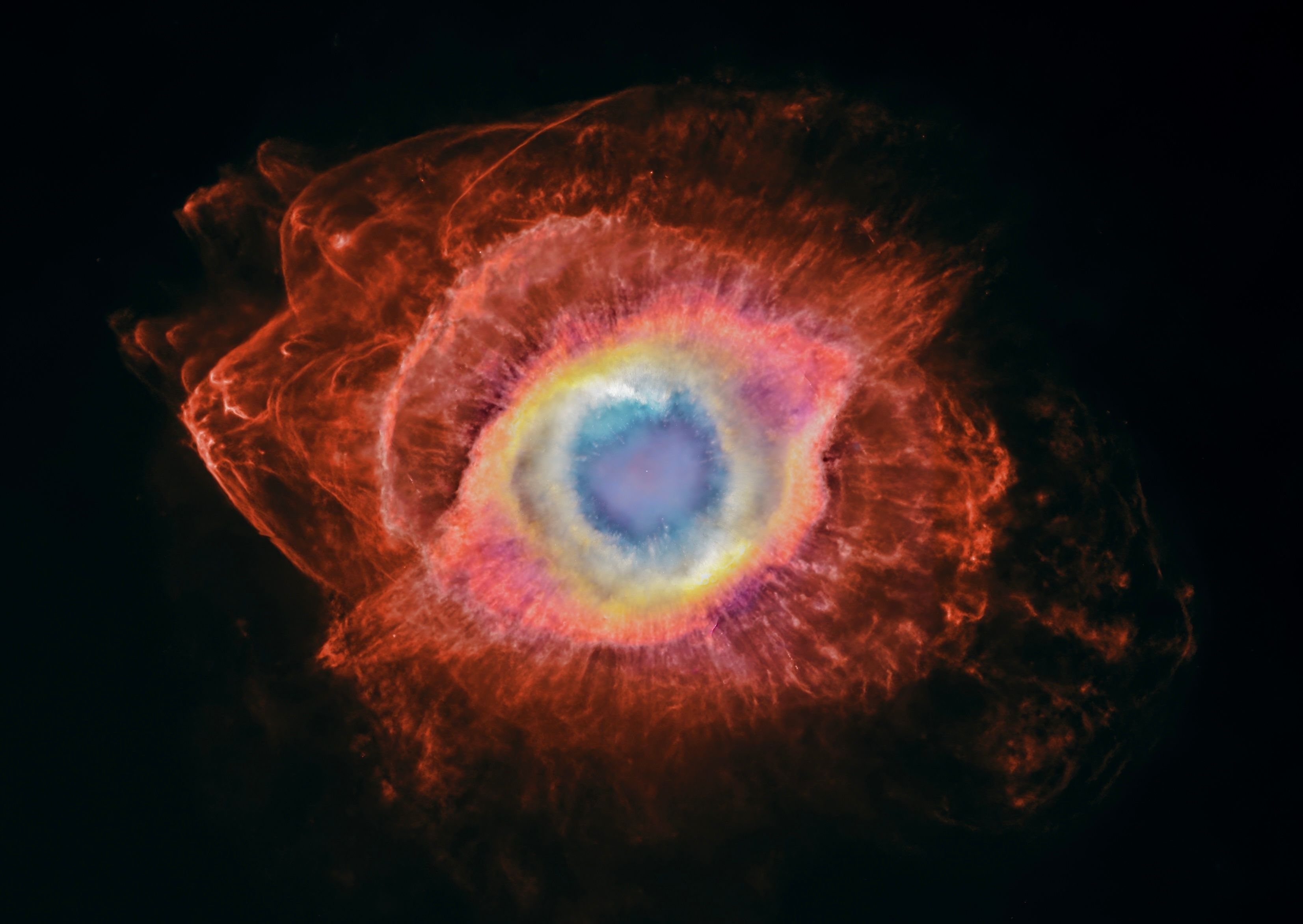 The Helix Nebula and the cosmic recycling of stellar material.