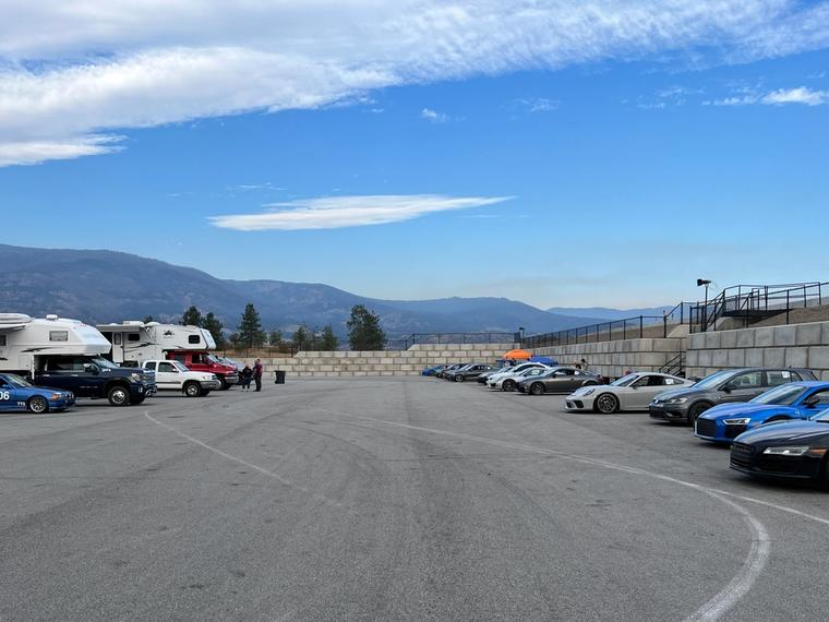 Cars and support vehicles at Area 27 race track
