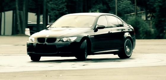 BMW sliding in wet conditions.  Photo by Christian Bouchez.