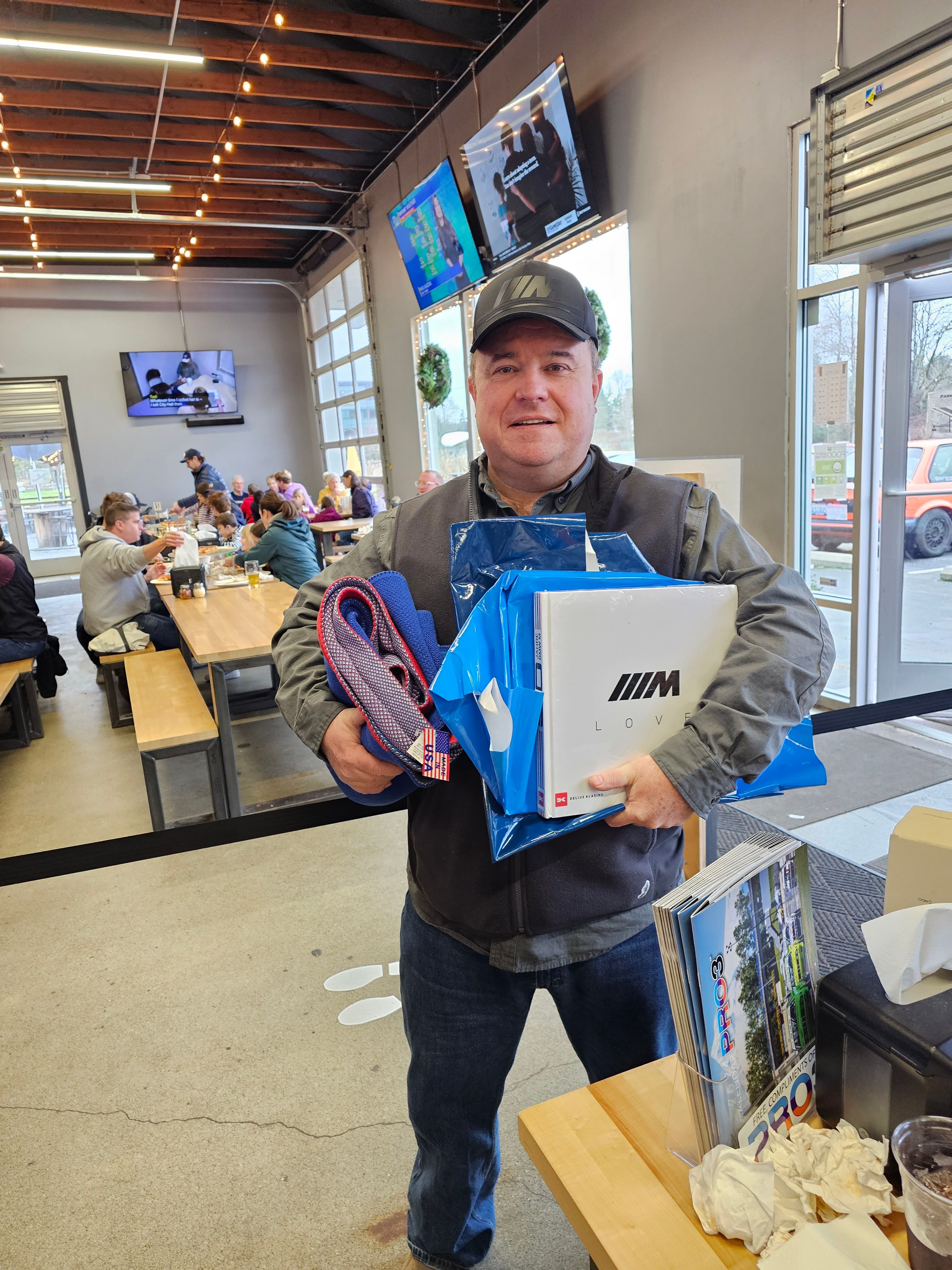Andy holds his gifts. 