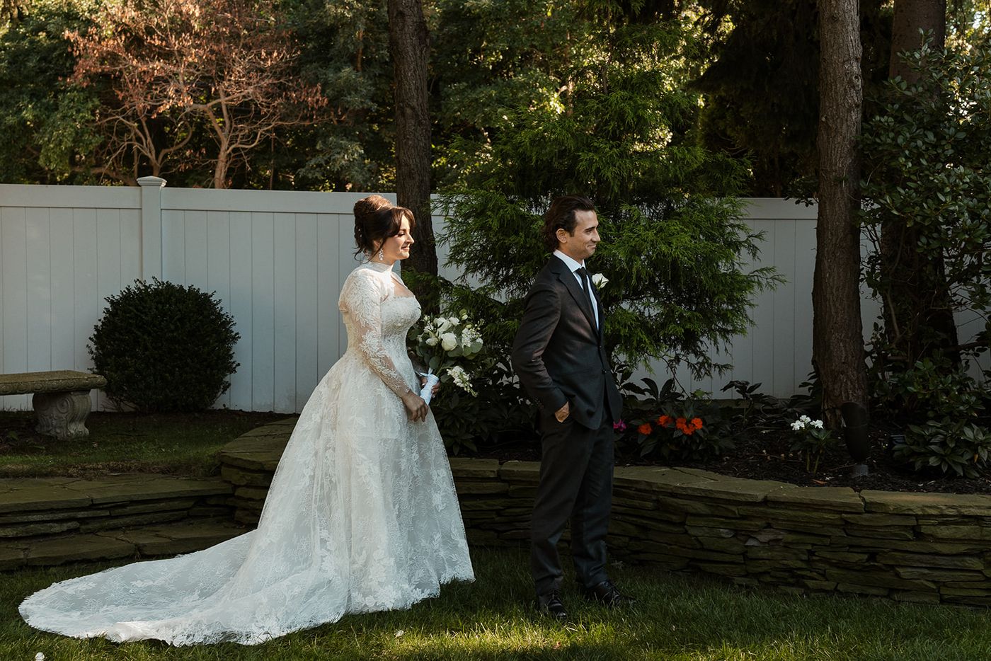 First look in the garden at The Fox Hollow, a Woodbury wedding venue on Long Island