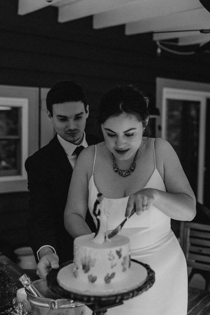 couple cutting cake
