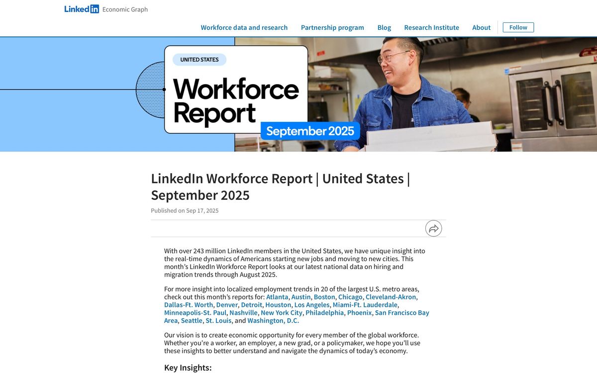A man smiles while holding boxes in a professional kitchen, illustrating LinkedIn's September 2025 Workforce Report.