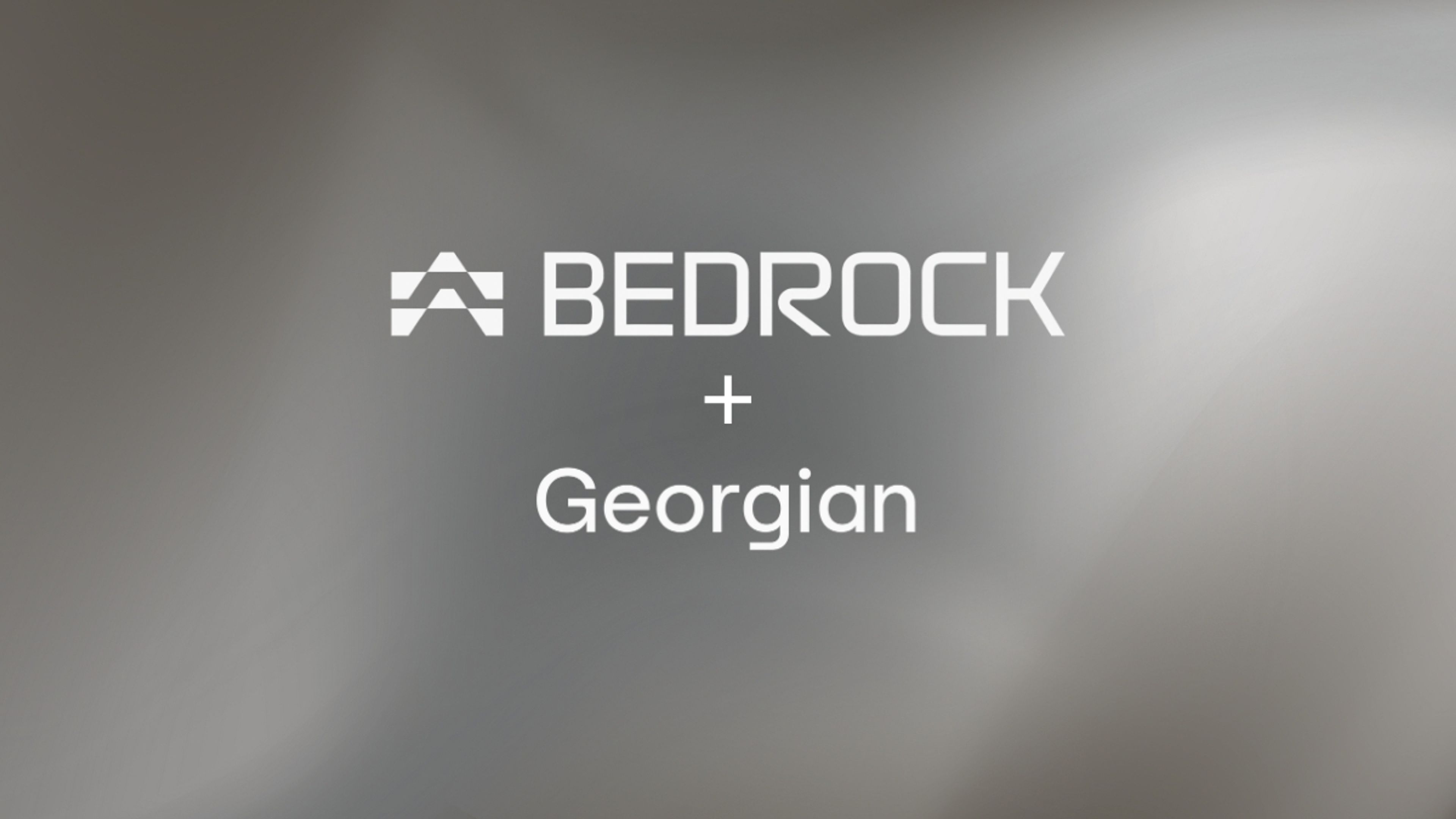The text "BEDROCK + Georgian" on a blurred grey background.
