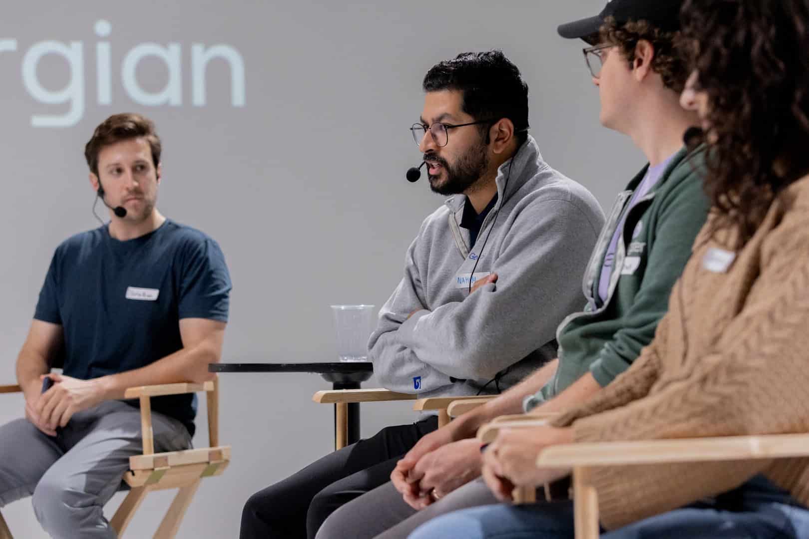 Nahim Nasser (center) speaking on a panel at an event October 2025. Photo credit_ Qasim Virjee, Startwell Studios
