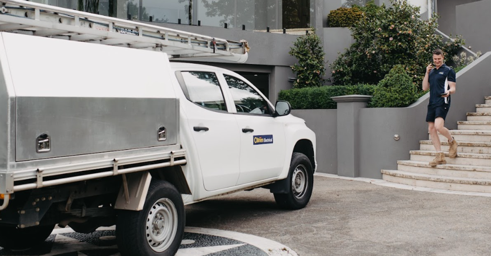 An O’Brien work ute parked in a driveway