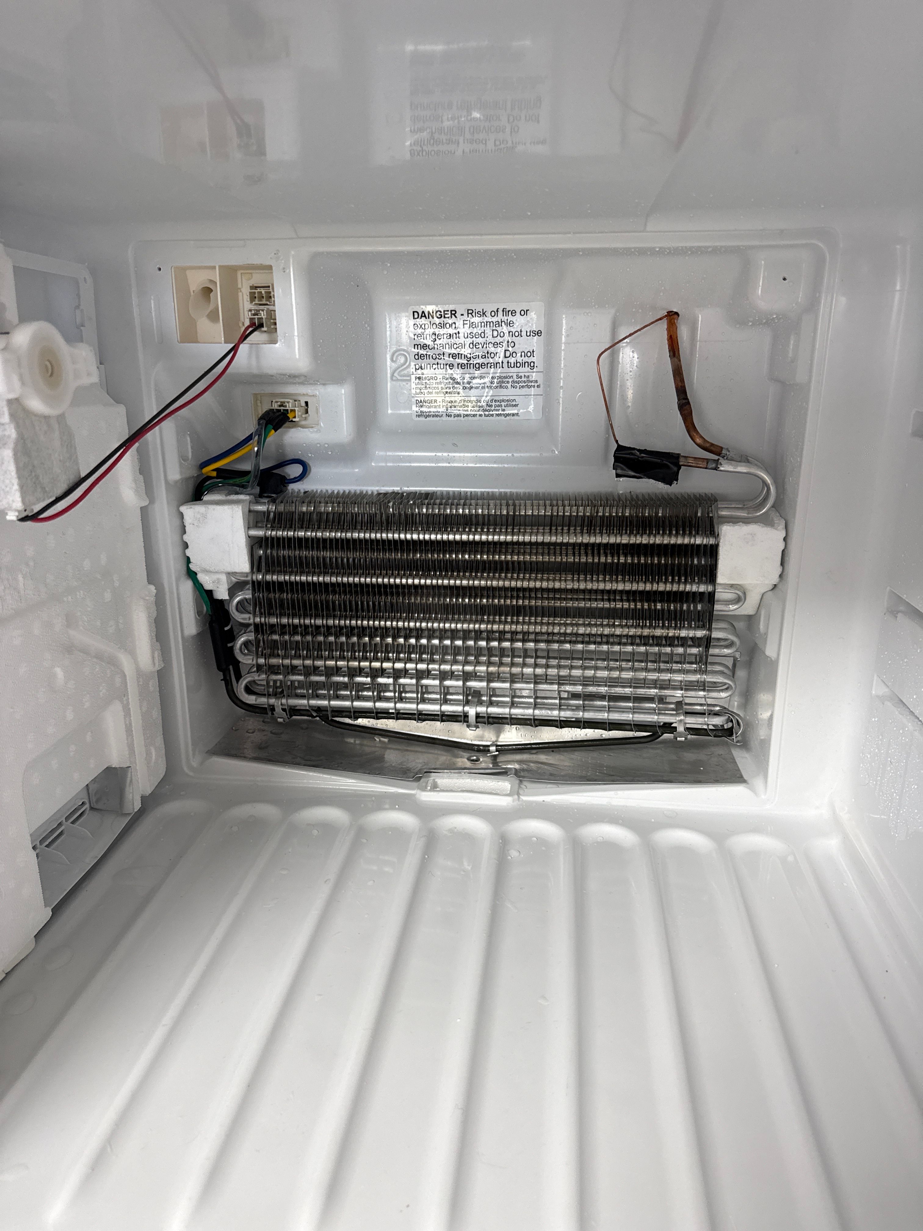 A Frigidaire Refrigerator Not Cooling With an Iced-Over Coil in Chicago (photo 1)