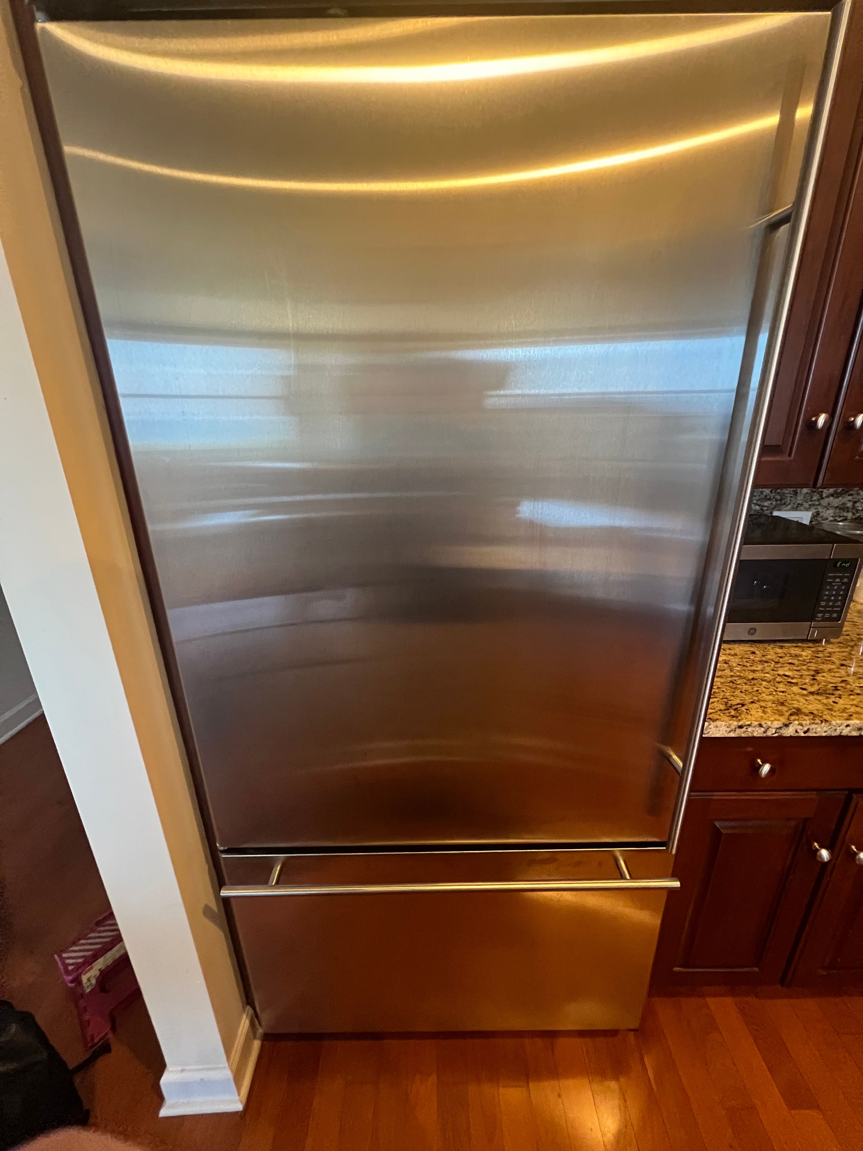A GE Monogram Built-In With Ice Building Up in the Freezer in Chicago (photo 1)