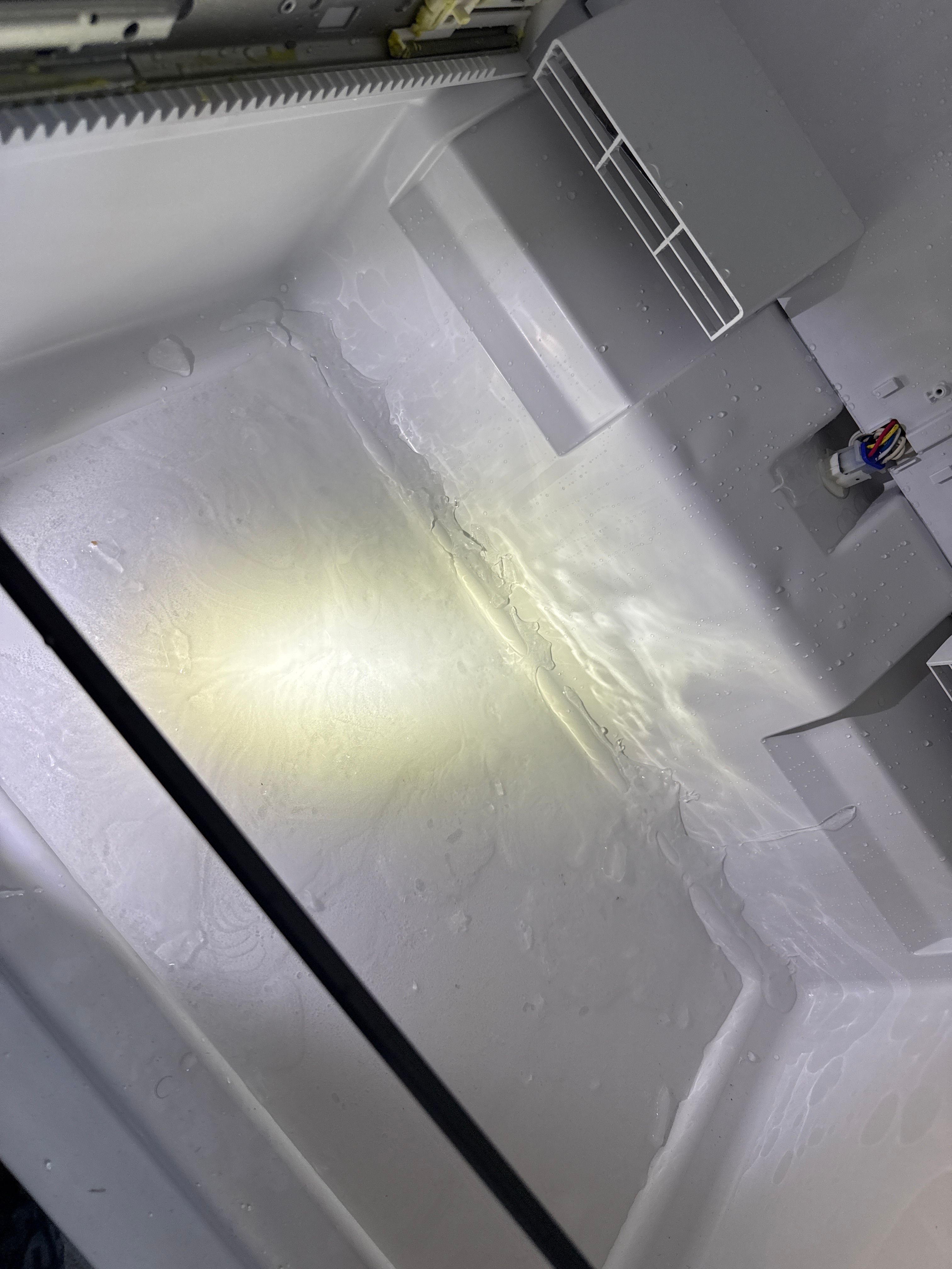 A GE Refrigerator Collecting Moisture on an Interior Shelf in Crestwood (photo 2)
