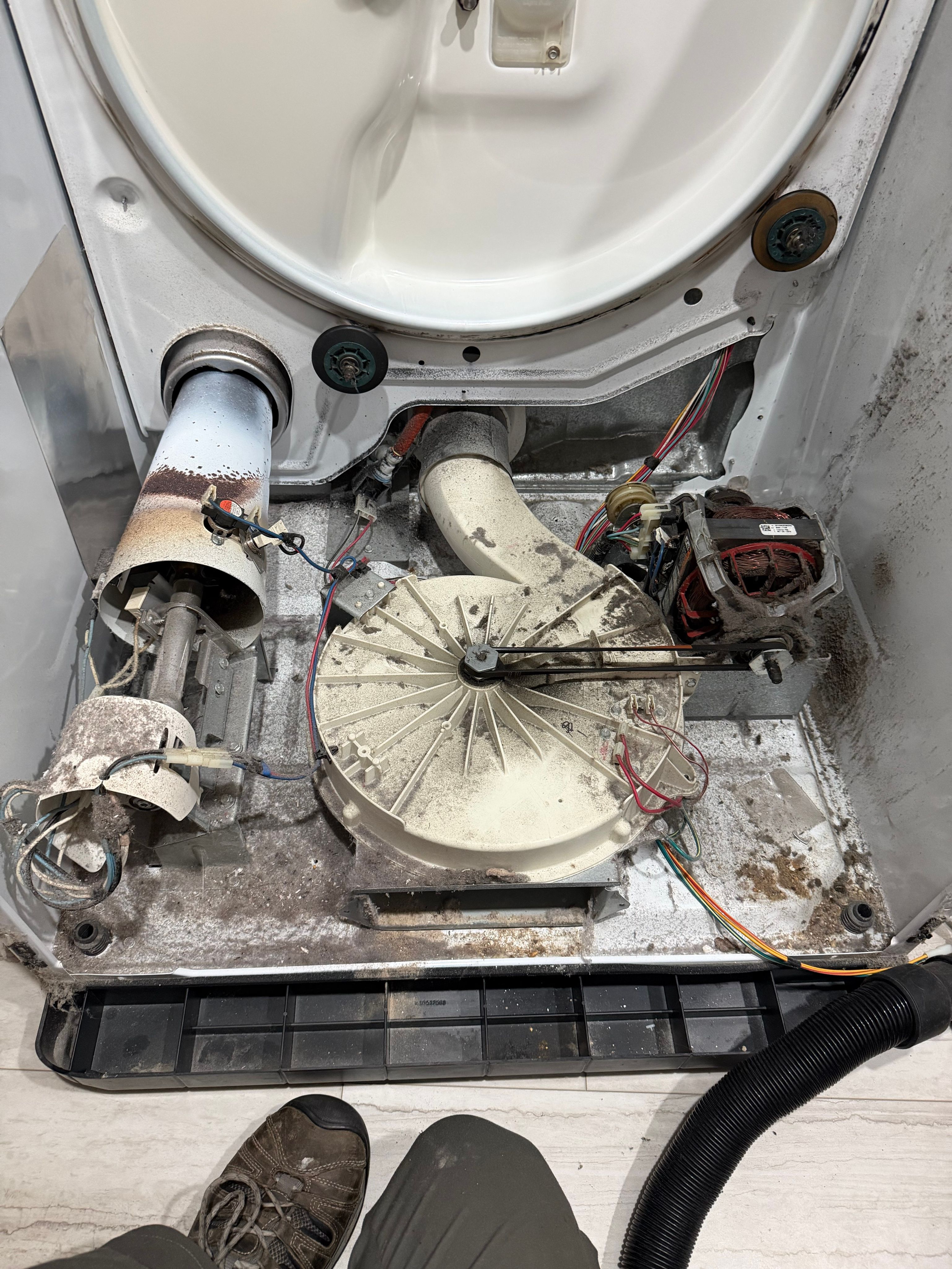 A Noisy Dryer Fixed With New Drum Rollers and a Cleaning in Naperville (photo 3)