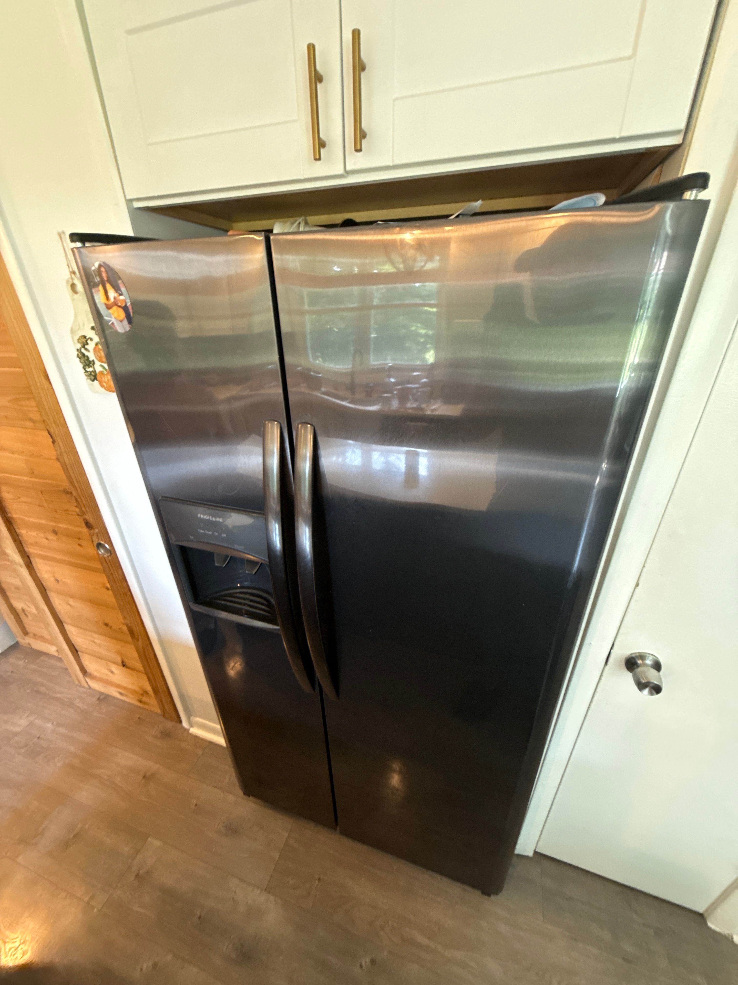 A Frigidaire Freezer Leaking Water From Under the Door in Lansing (photo 2)