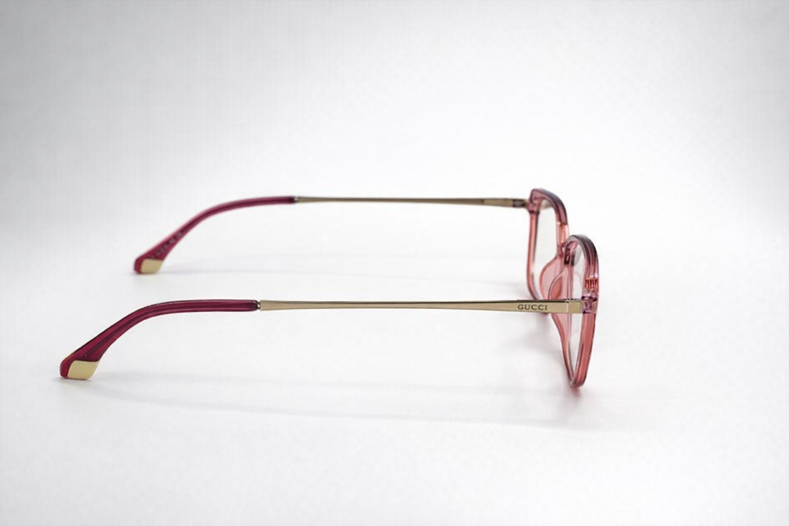 Gucci Square Eyeglasses – Translucent Rose Crystal Frame with Gold Metal Temples