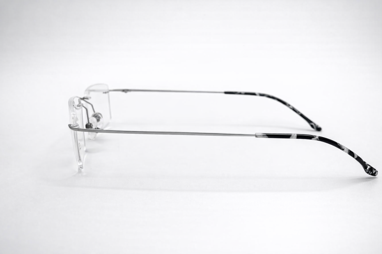 Silhouette Rectangular Glasses - Rimless Slim White
