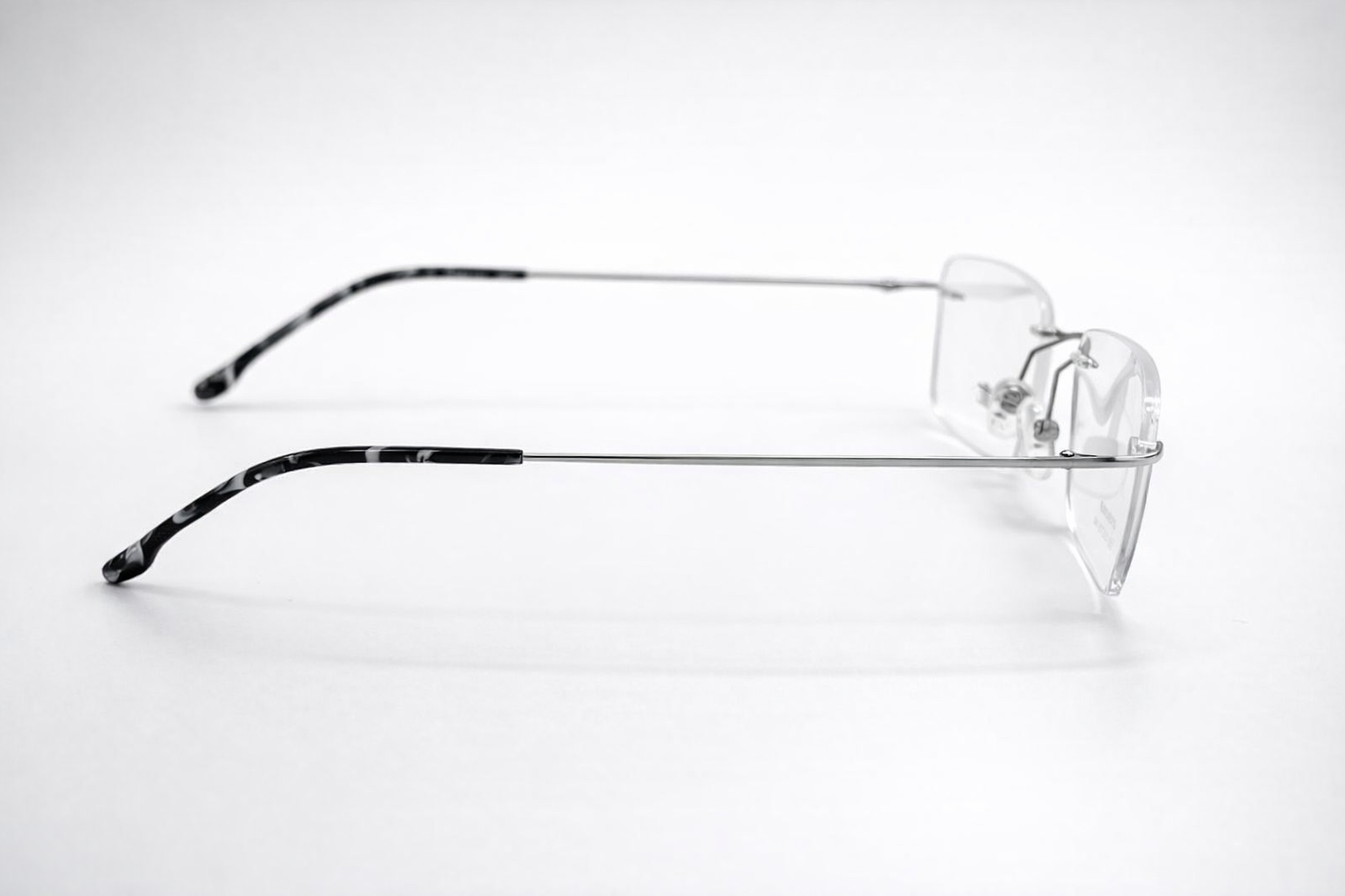 Silhouette Rectangular Glasses - Rimless Slim White
