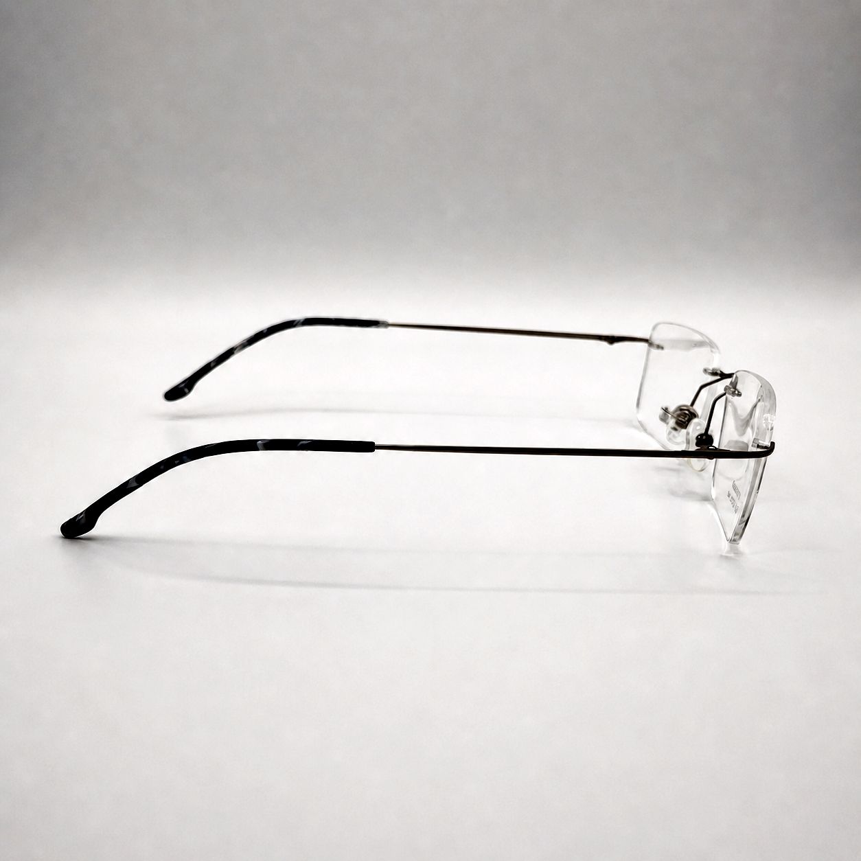 Silhouette Rectangular Glasses - Rimless Slim White