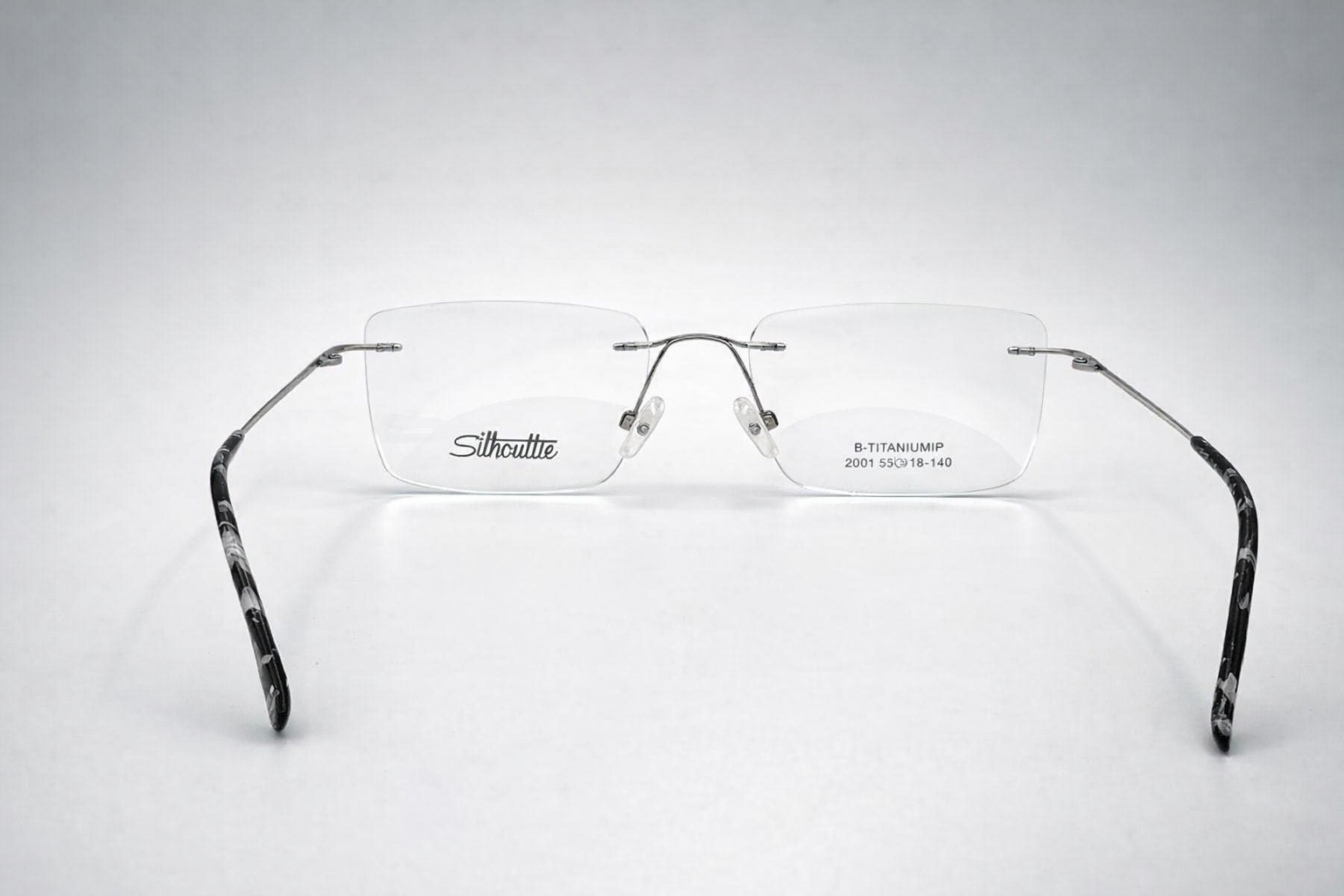 Silhouette Rectangular Glasses - Rimless Slim White
