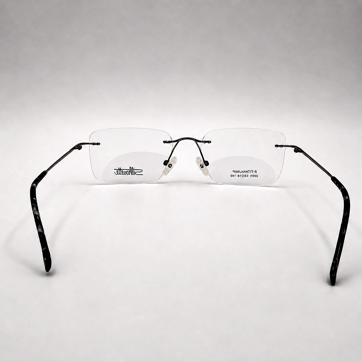 Silhouette Rectangular Glasses - Rimless Slim White