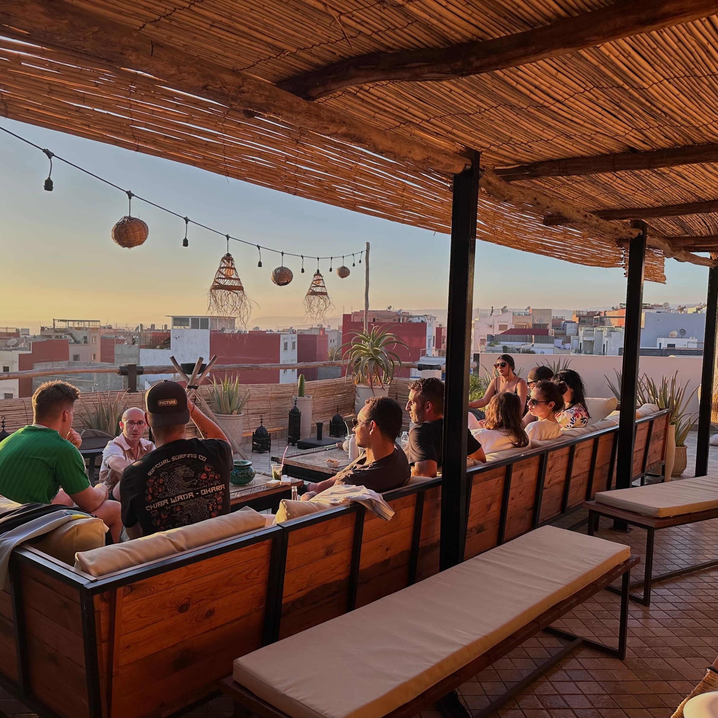 Rooftop dinner overlooking Tamraght at sunset