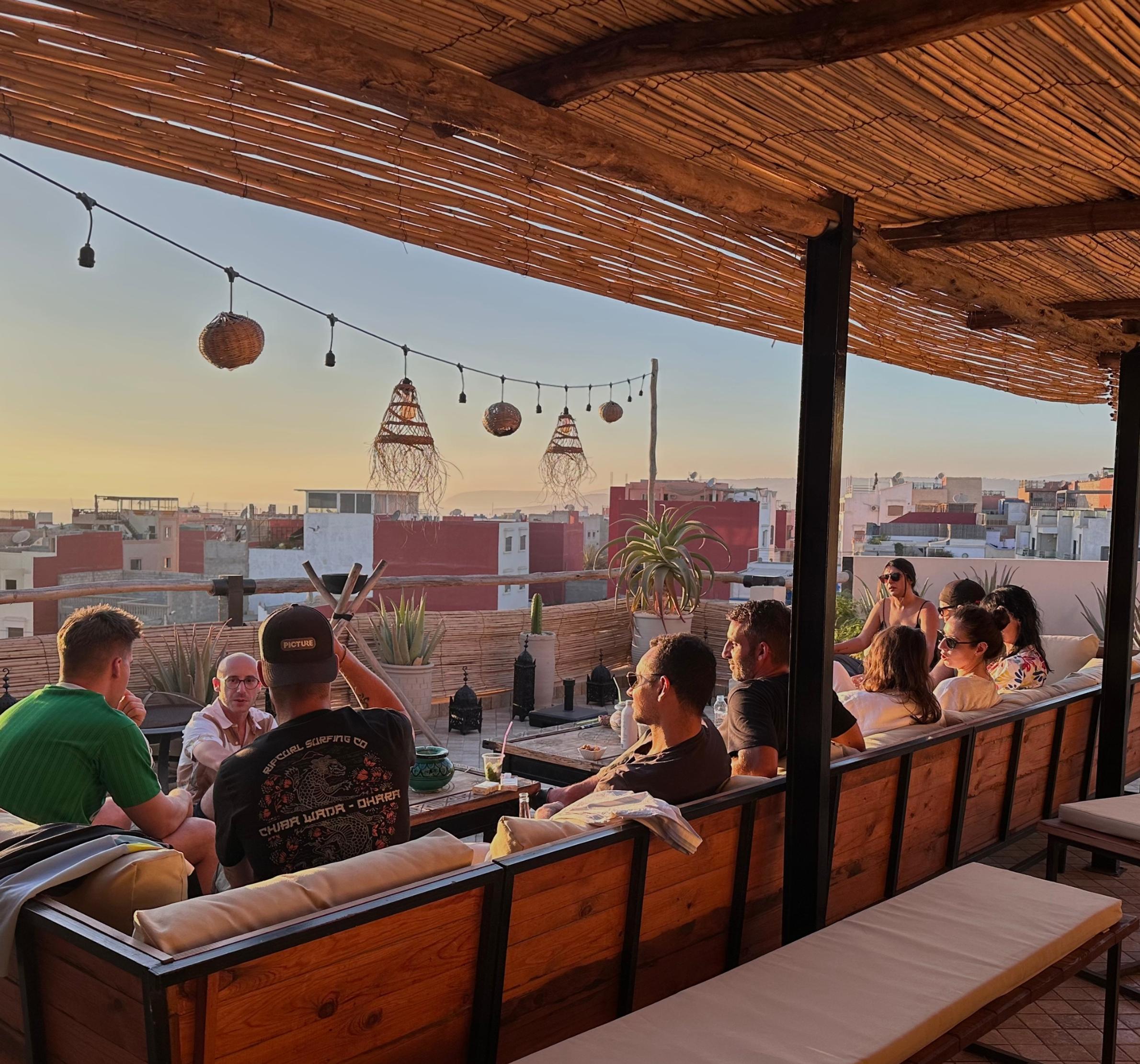 Rooftop dinner overlooking Tamraght at sunset