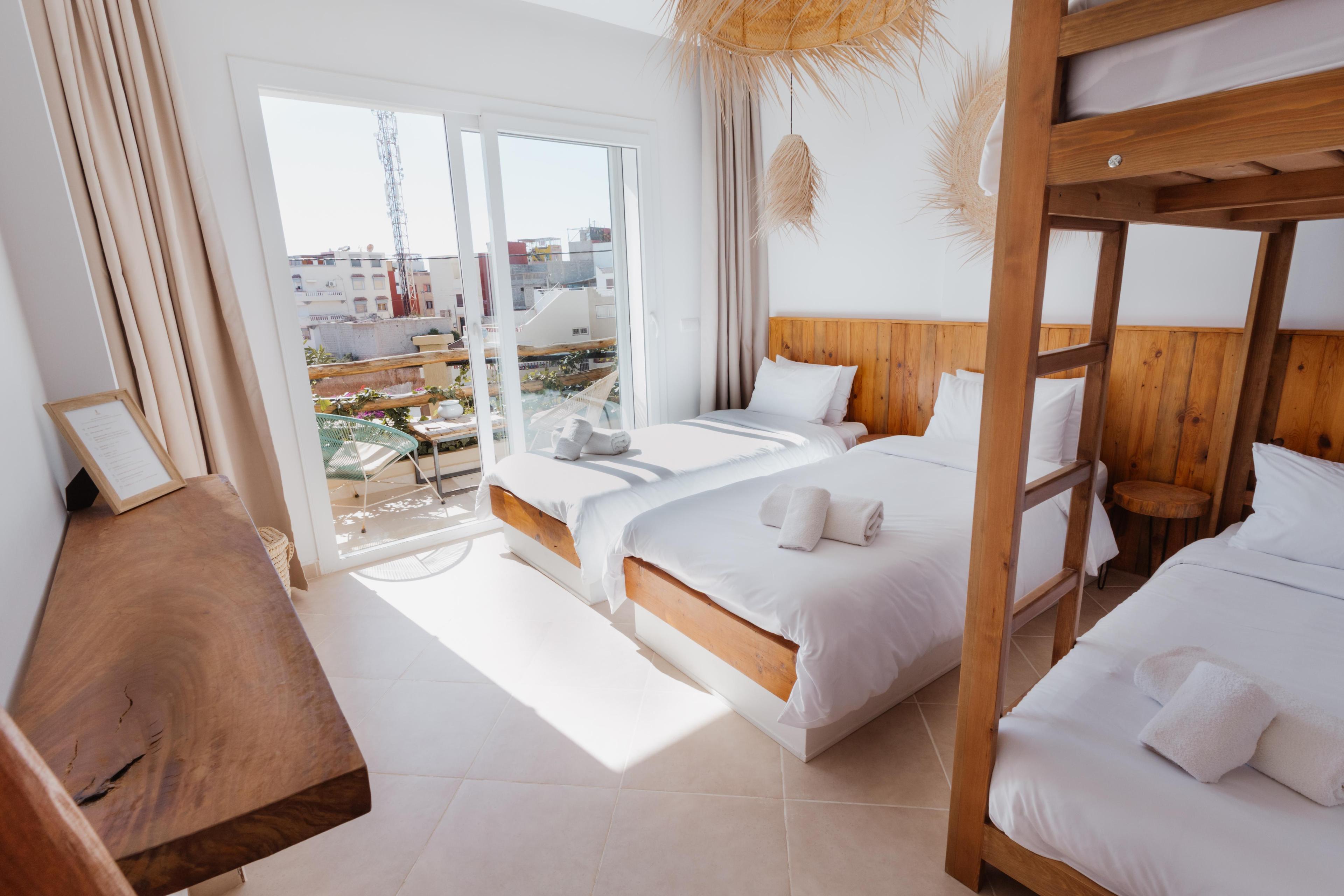 Shared room of 4 with single beds at Tamraght surf house