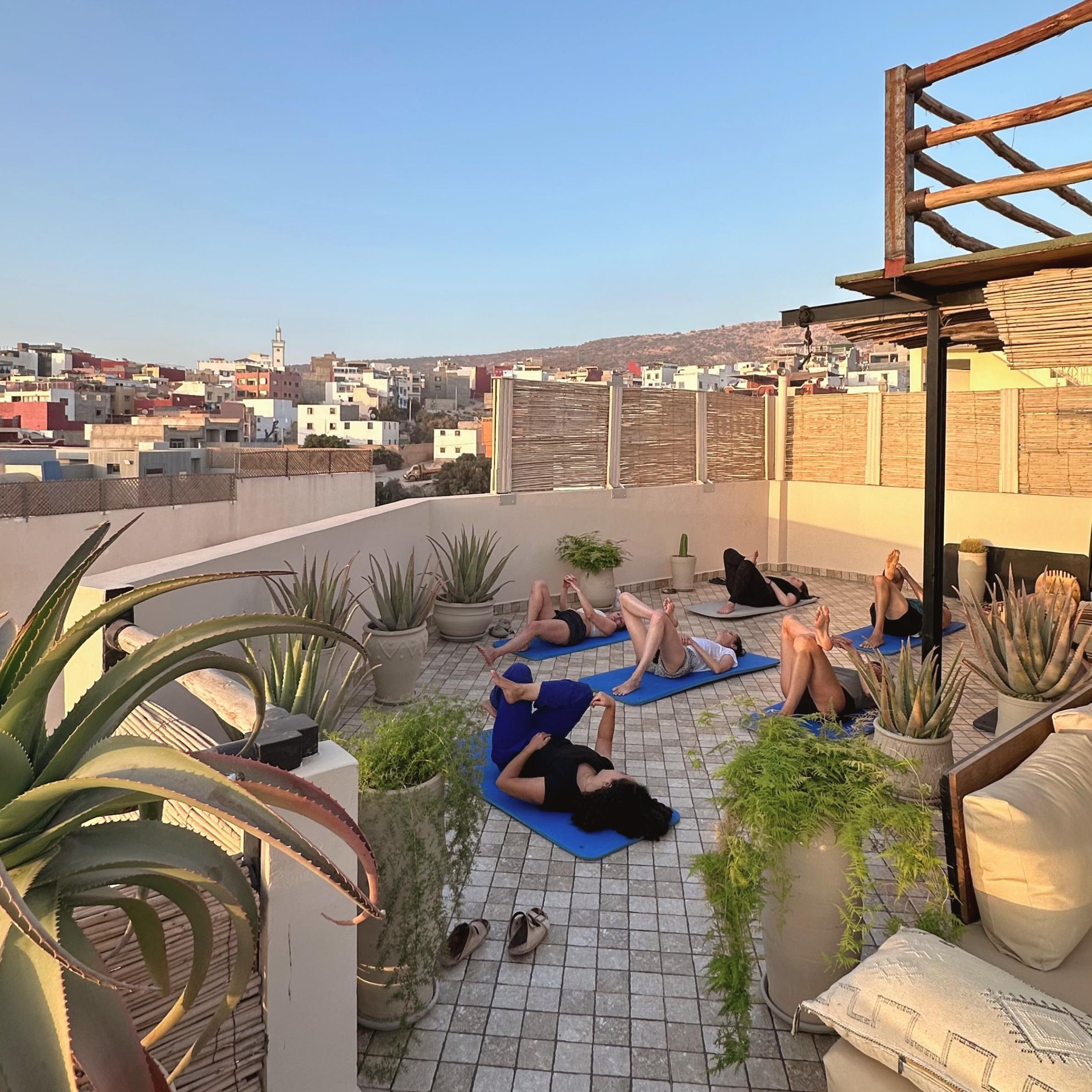 Group yoga session at the Sea Me Smile surf house
