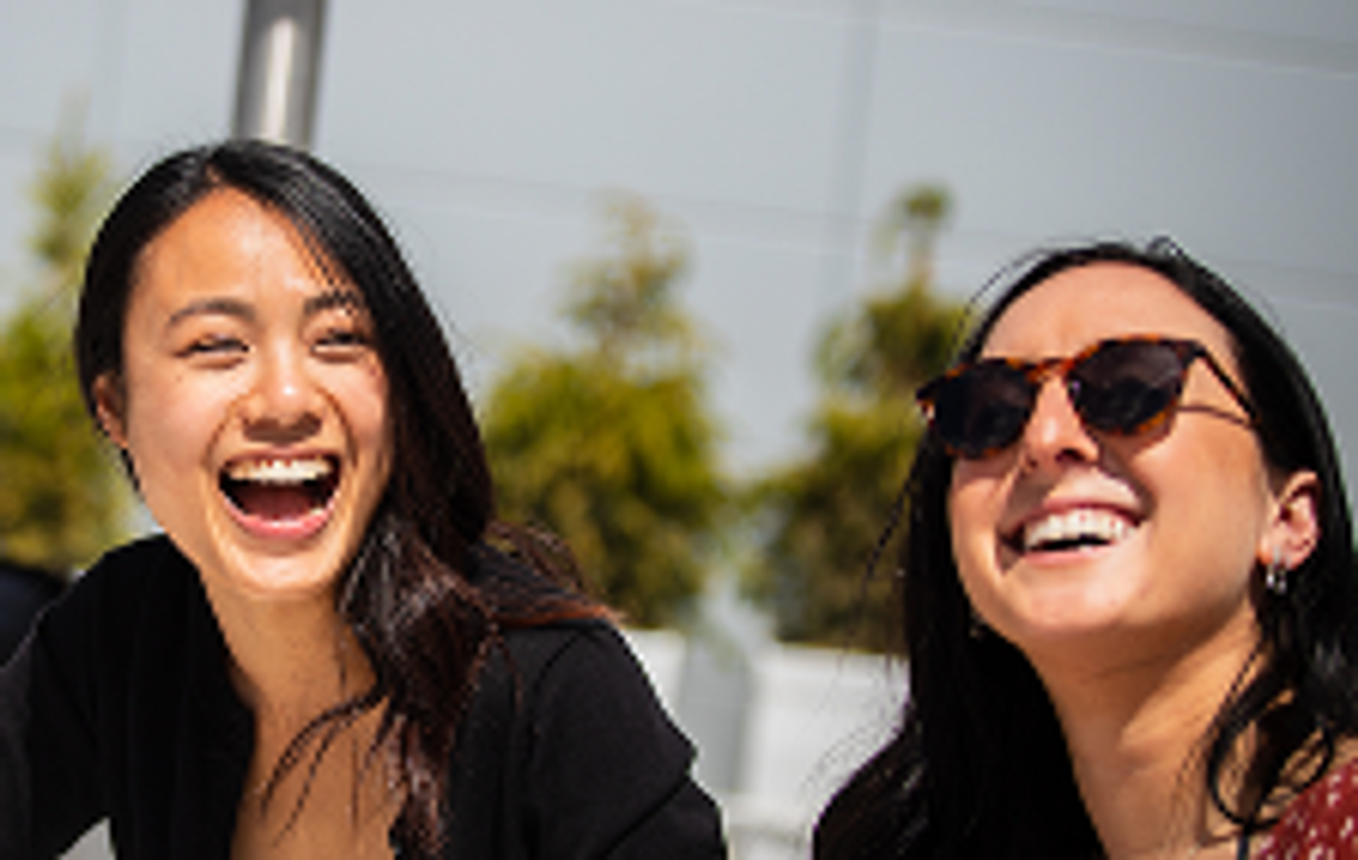 Two girls laughing